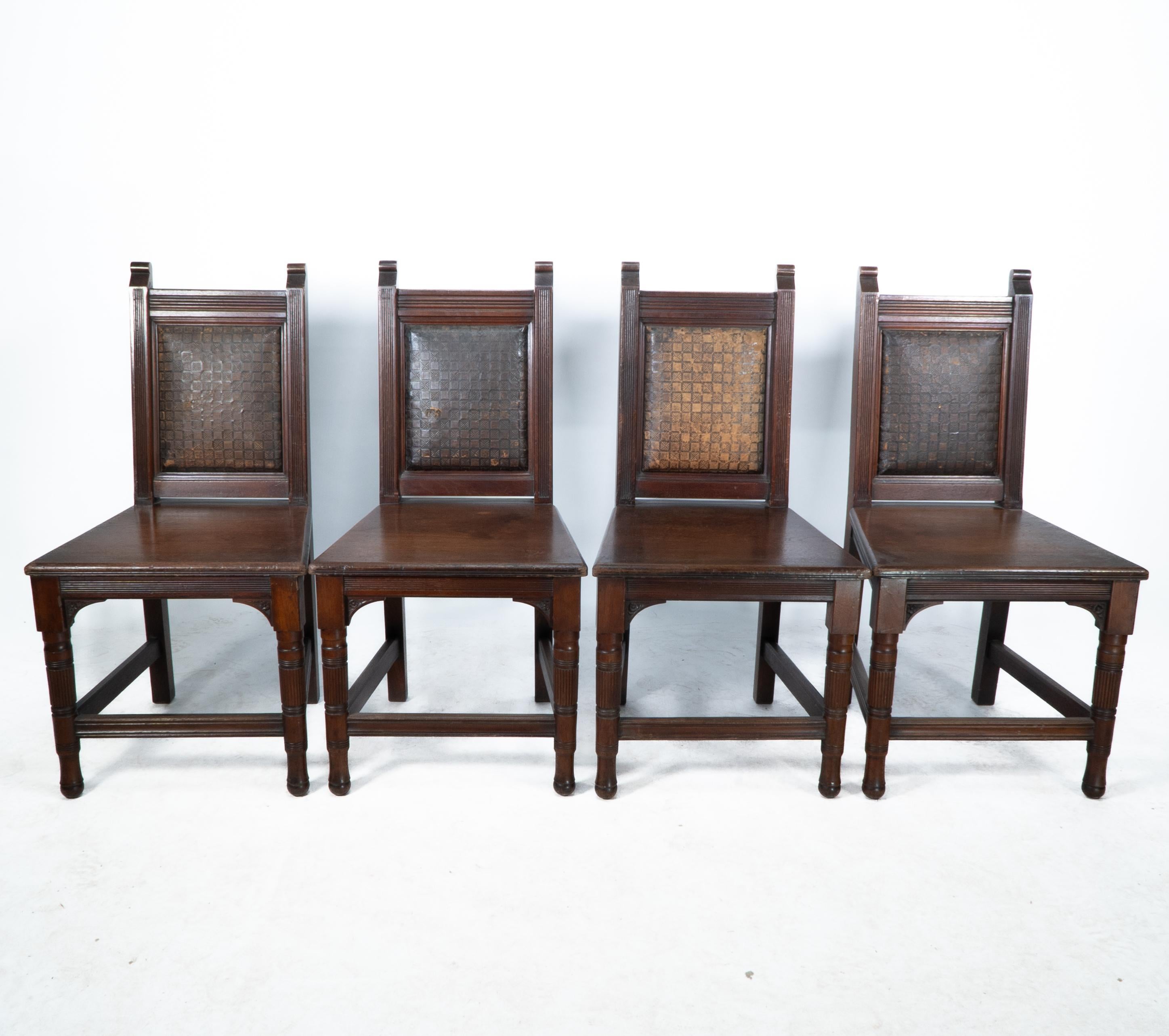 Arts and Crafts Set of Four Aesthetic Hall Chairs in the Manner of E W Godwin For Sale
