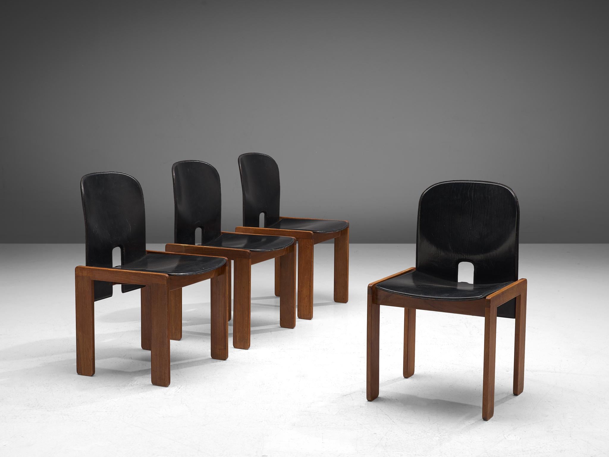 Afra & Tobia Scarpa for Cassina, set of four chairs model 121, leather and walnut, Italy, 1965.

Set of four chairs by Italian designer couple Tobia and Afra Scarpa. These chairs have a cubic and architectural appearance. The base consist of four