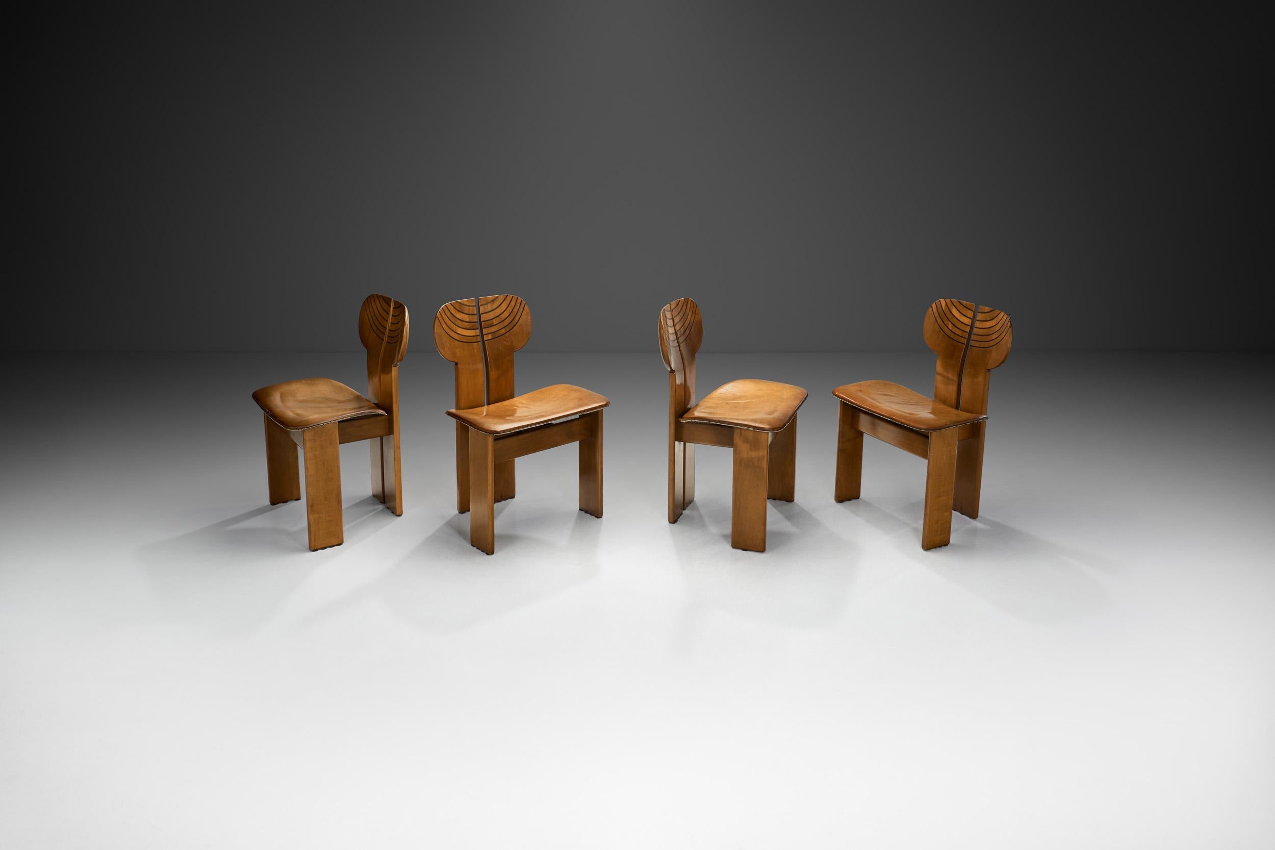 The 1960s and 1970s saw Italian interior design become world renowned and revered. This set of four “Africa” chairs were born from the creative genius of design-duo Afra and Tobia Scarpa in the mid-1970s. They are a perfect combination of