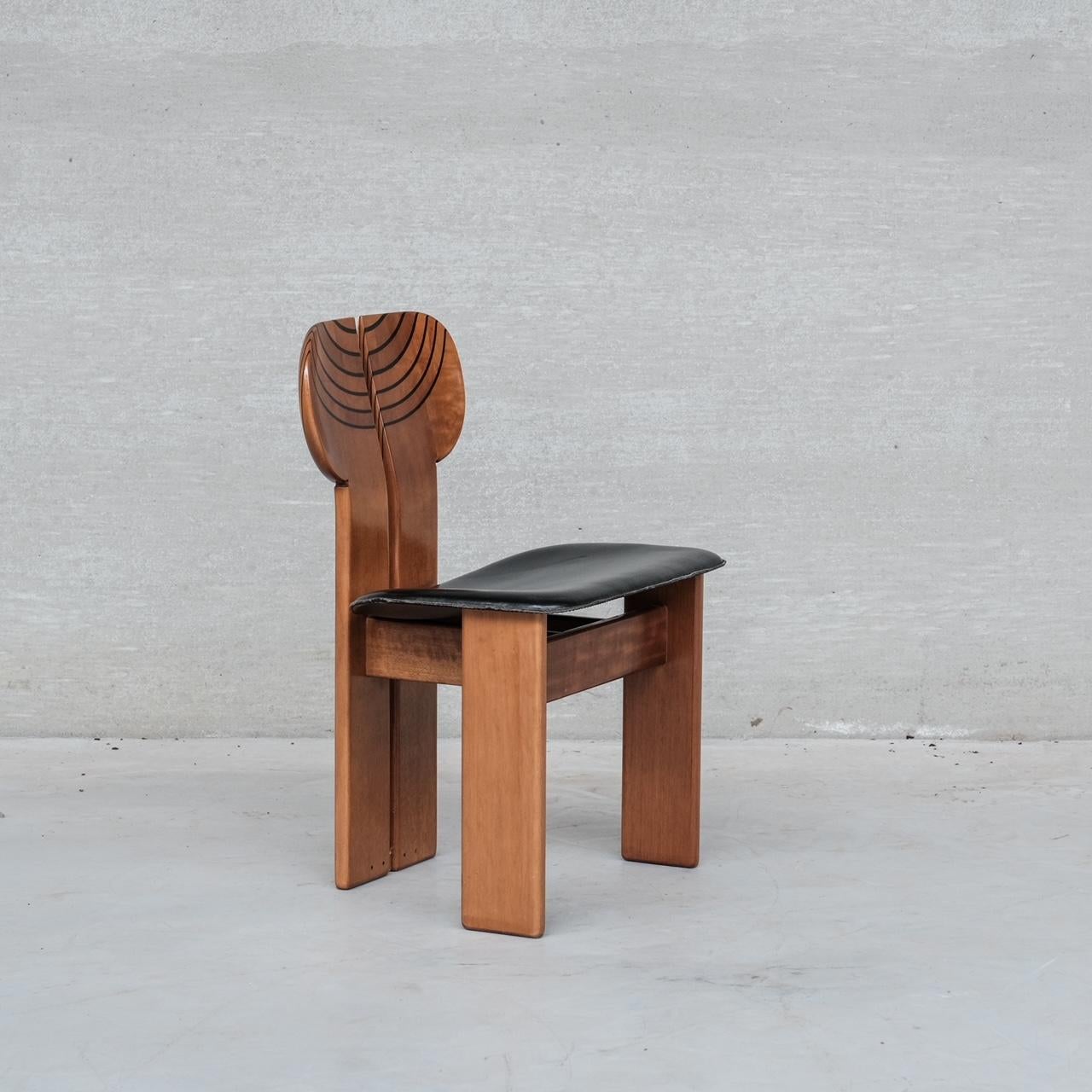 A rare set of dining chairs by Afra and Tobia Scarpa (re-upholstery included). 

Italy, c1975. 

For Maxalto. 

Designed as part of the 'Artona' line these scarce chairs are some of the most attractive perhaps ever designed. 

Leather and Walnut.