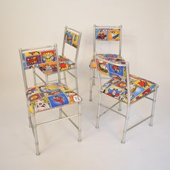 Juego de cuatro sillas de comedor de aluminio de Warren McArthur con funda de tela Pop Art