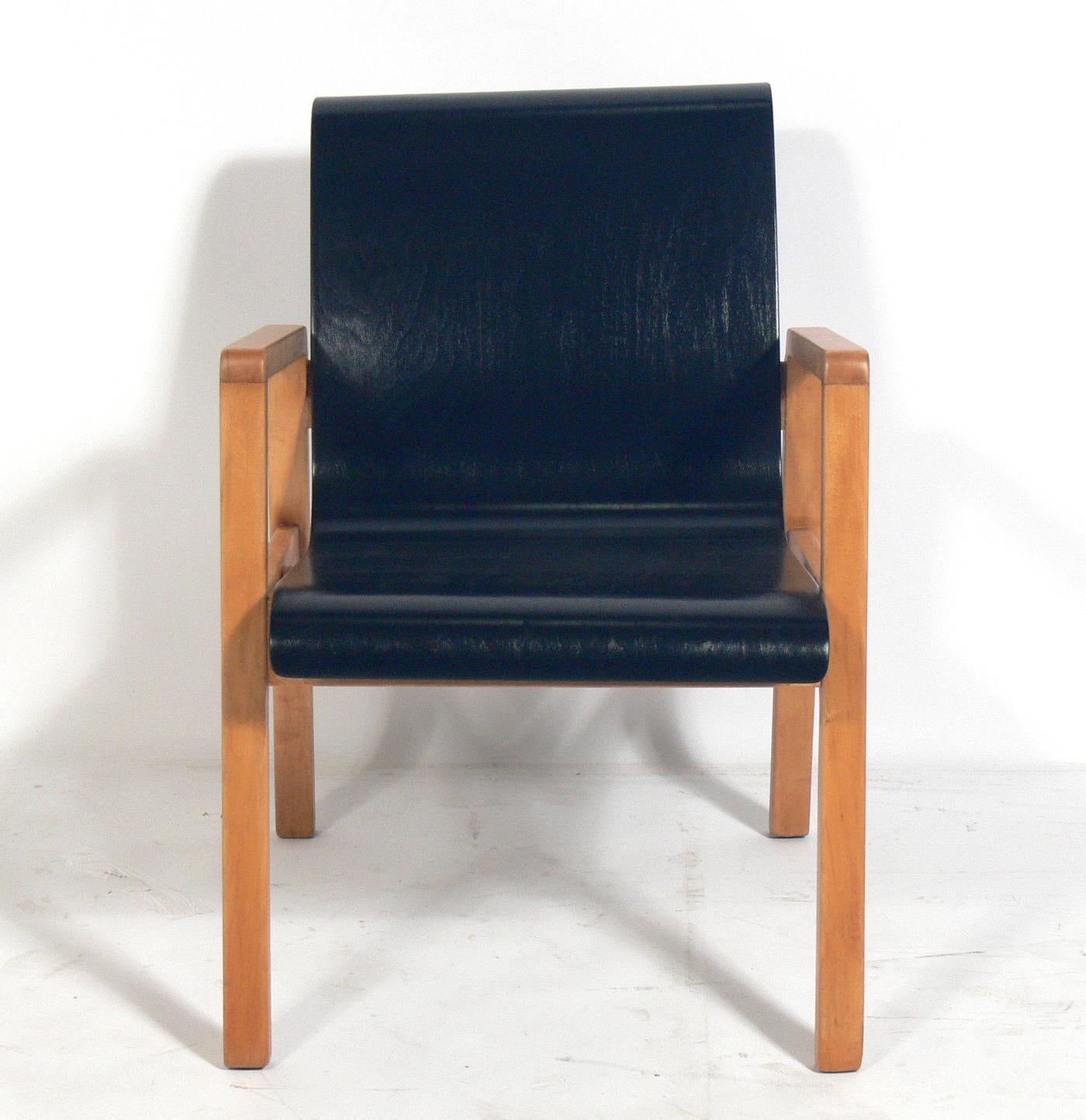 Set of four bentwood modern armchairs, designed by Alvar Aalto, Finland, circa 1940s. They have been refinished and are ready to use. They are a versatile size and can be used as dining chairs, or as lounge or occasional chairs.