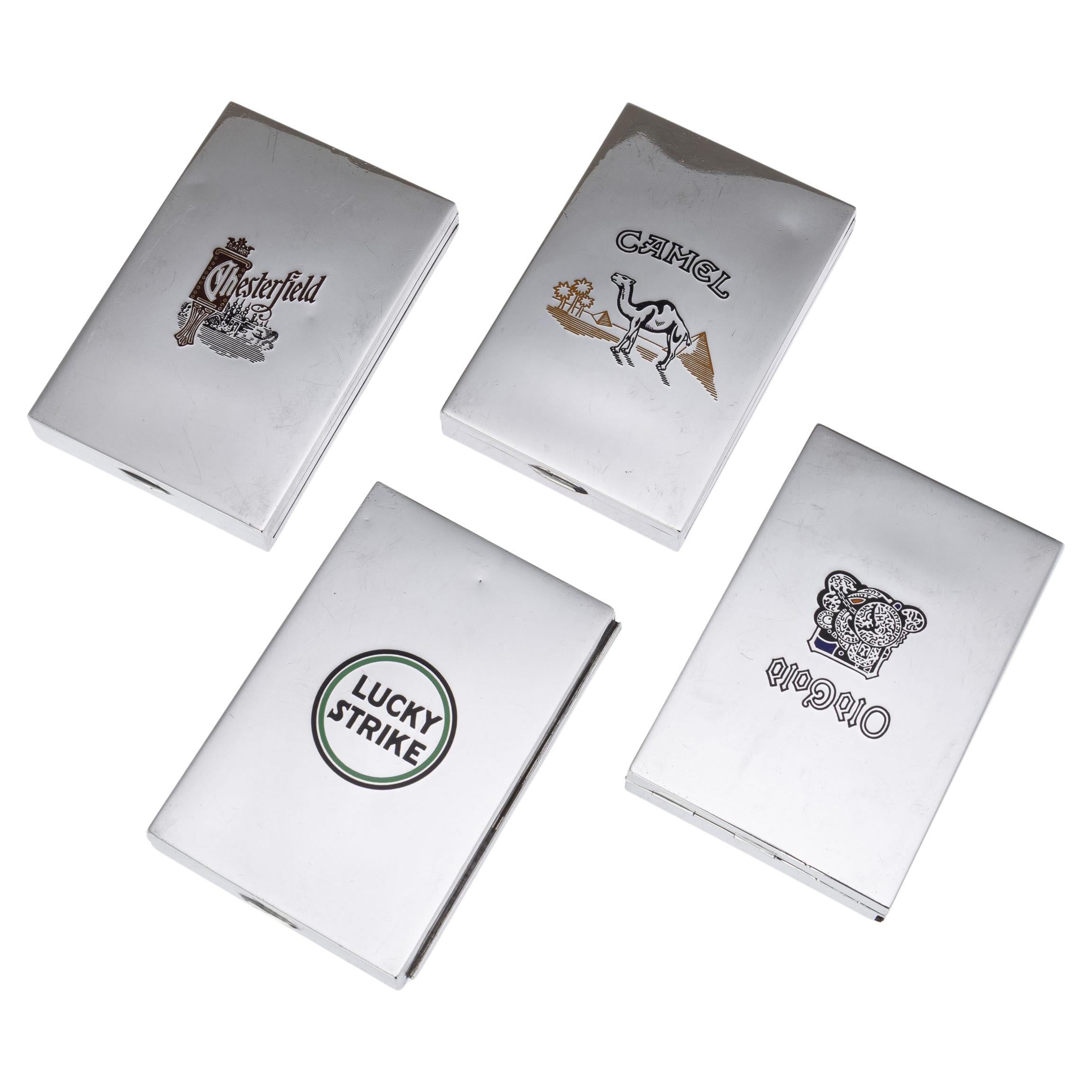 Set of Four American Solid Silver 
Enamel Cigarette Boxes by Cartier