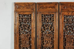 Set of Four Antique Chinese Architectural Panels with Carved Lattice and Figures