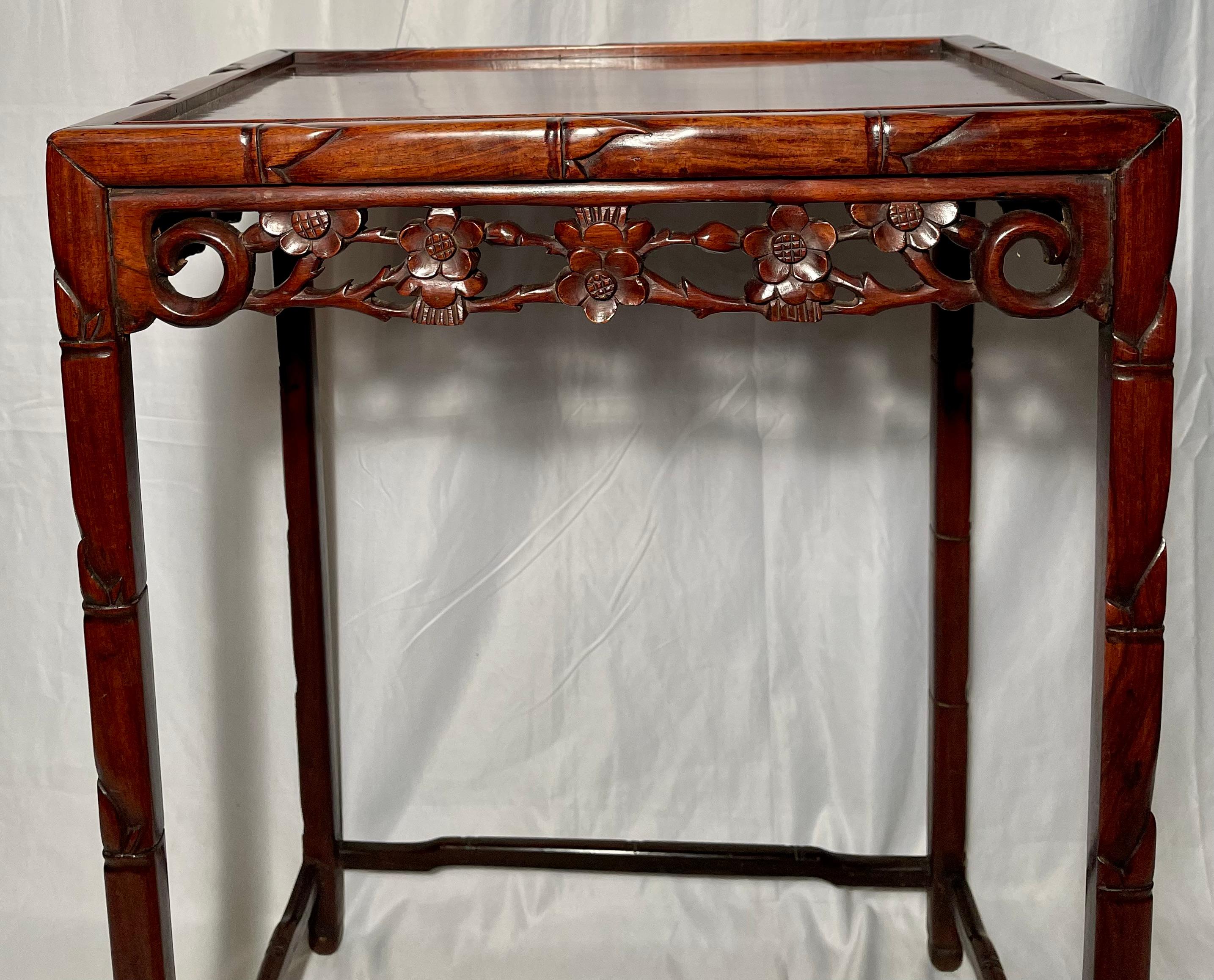 Hand-Carved Set of Four Antique Chinese Teakwood Nest of Tables, Circa 1890 For Sale
