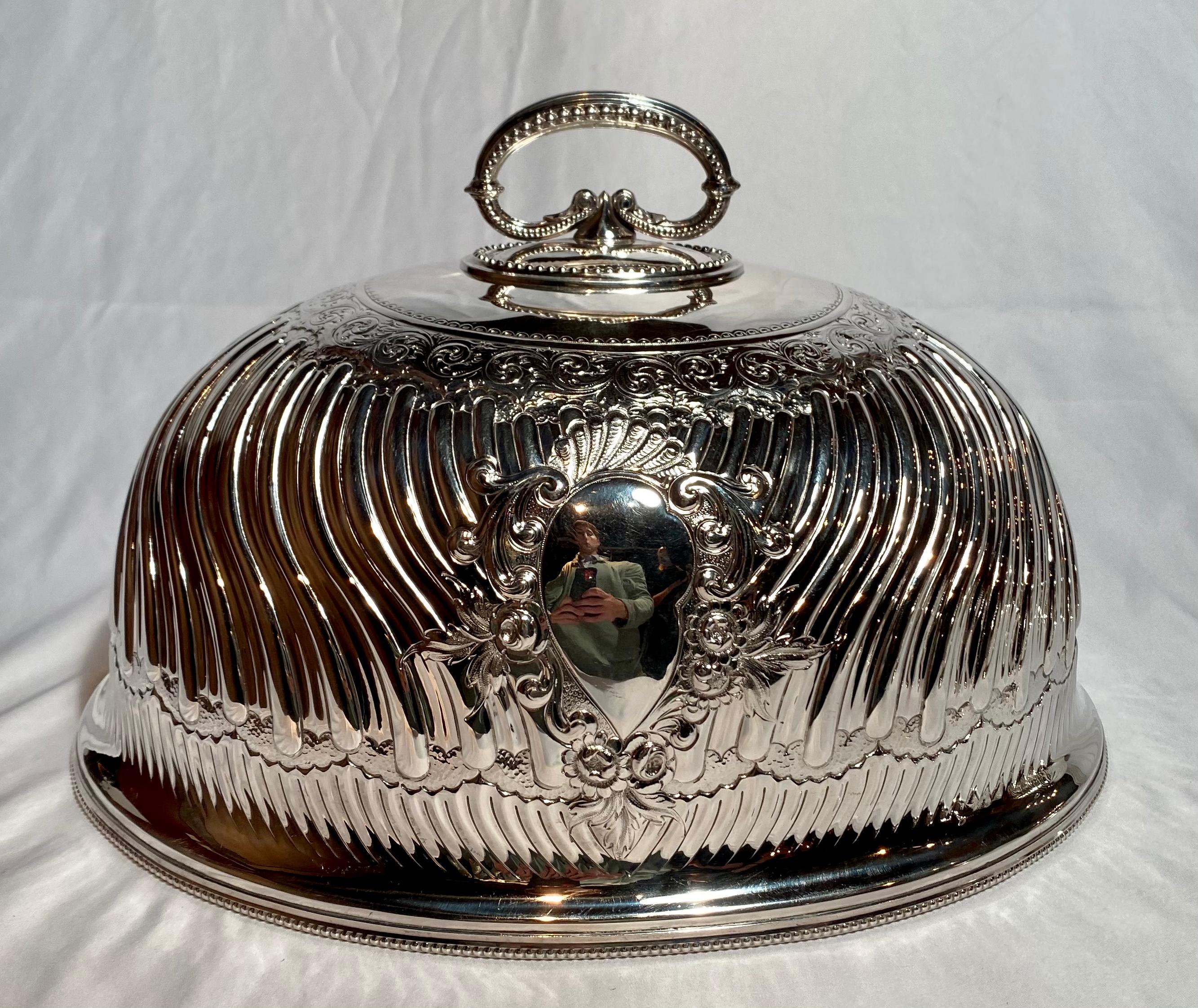 Set of four antique English silver plate domes, circa 1880.
  