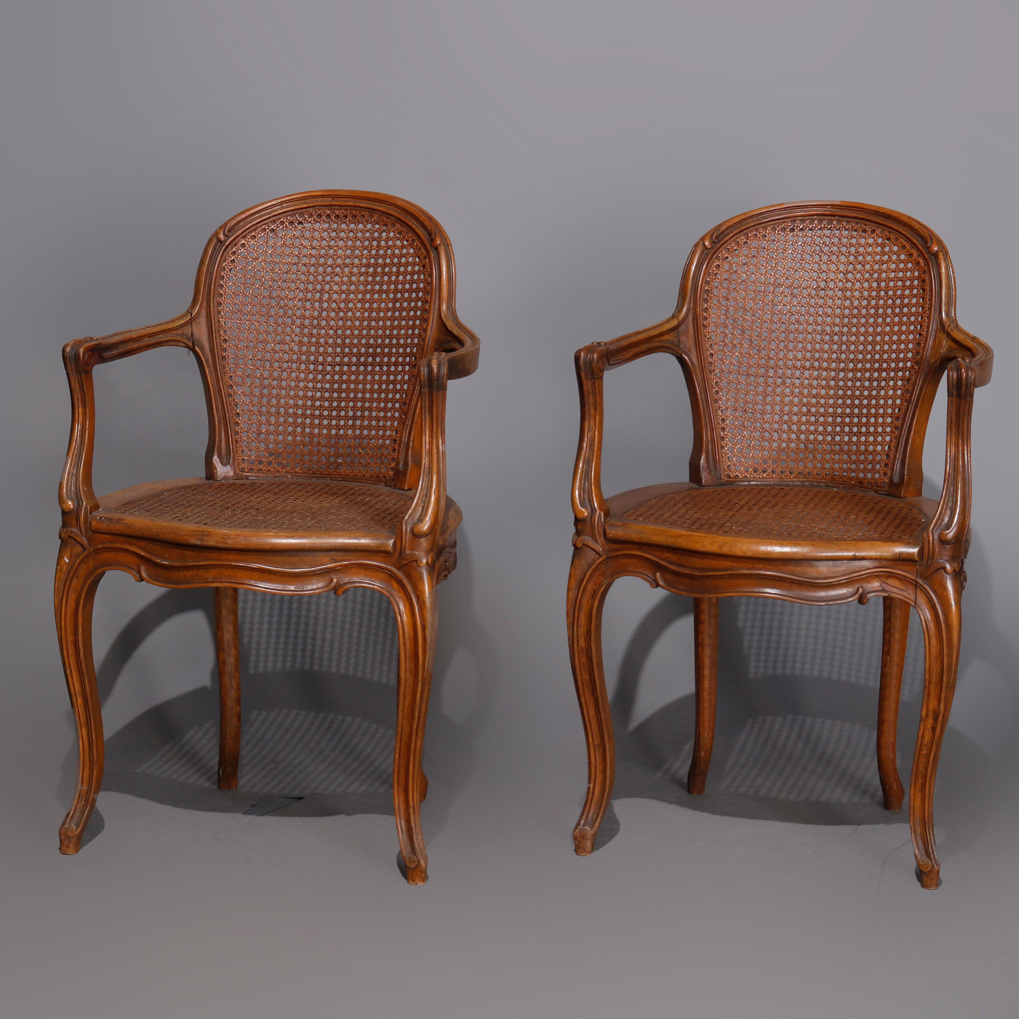 Set of Four Antique French Louis XVI Carved Walnut and Caned Armchairs 5