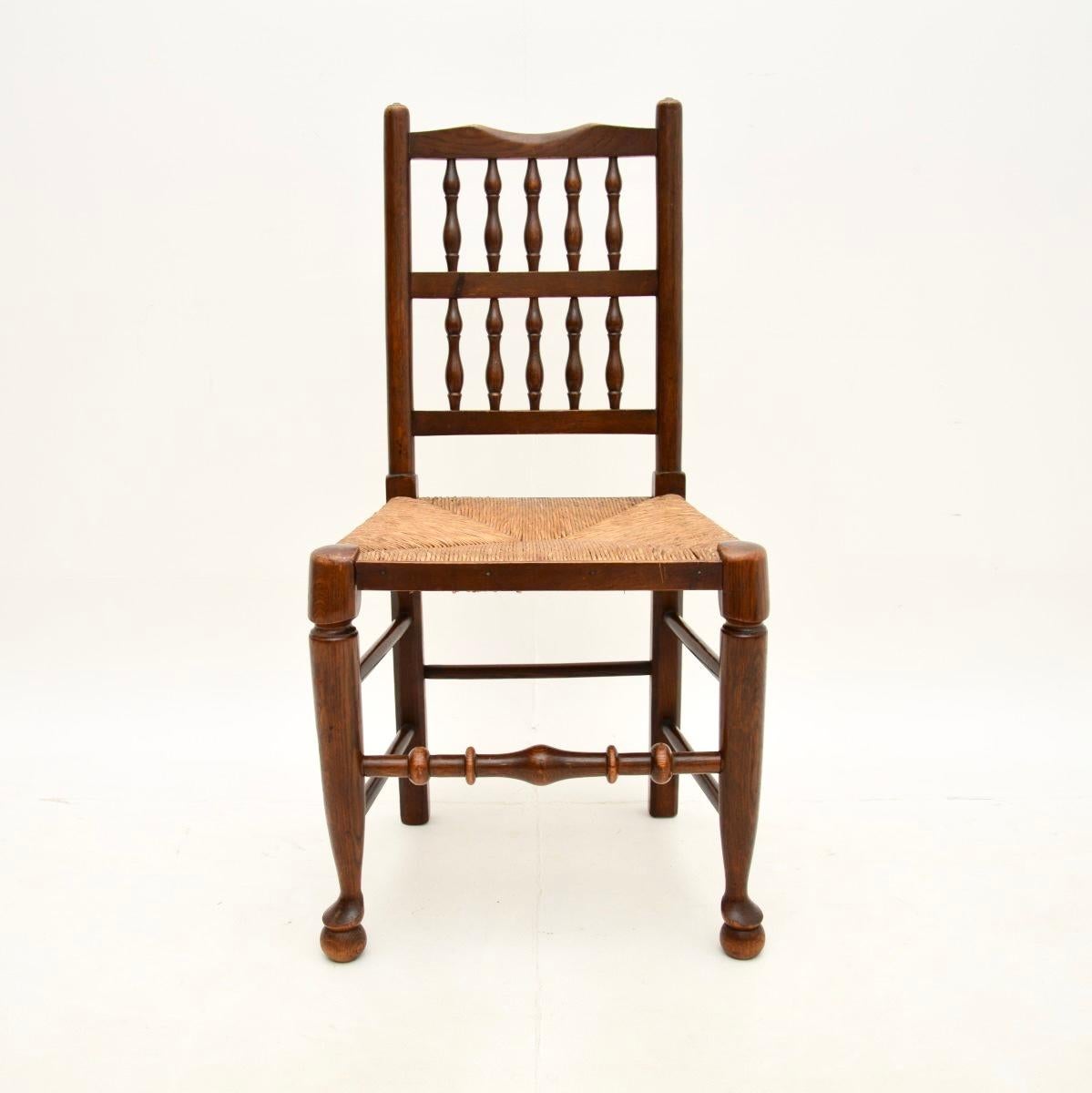 British Set of Four Antique Georgian Lancashire Dining Chairs in Elm