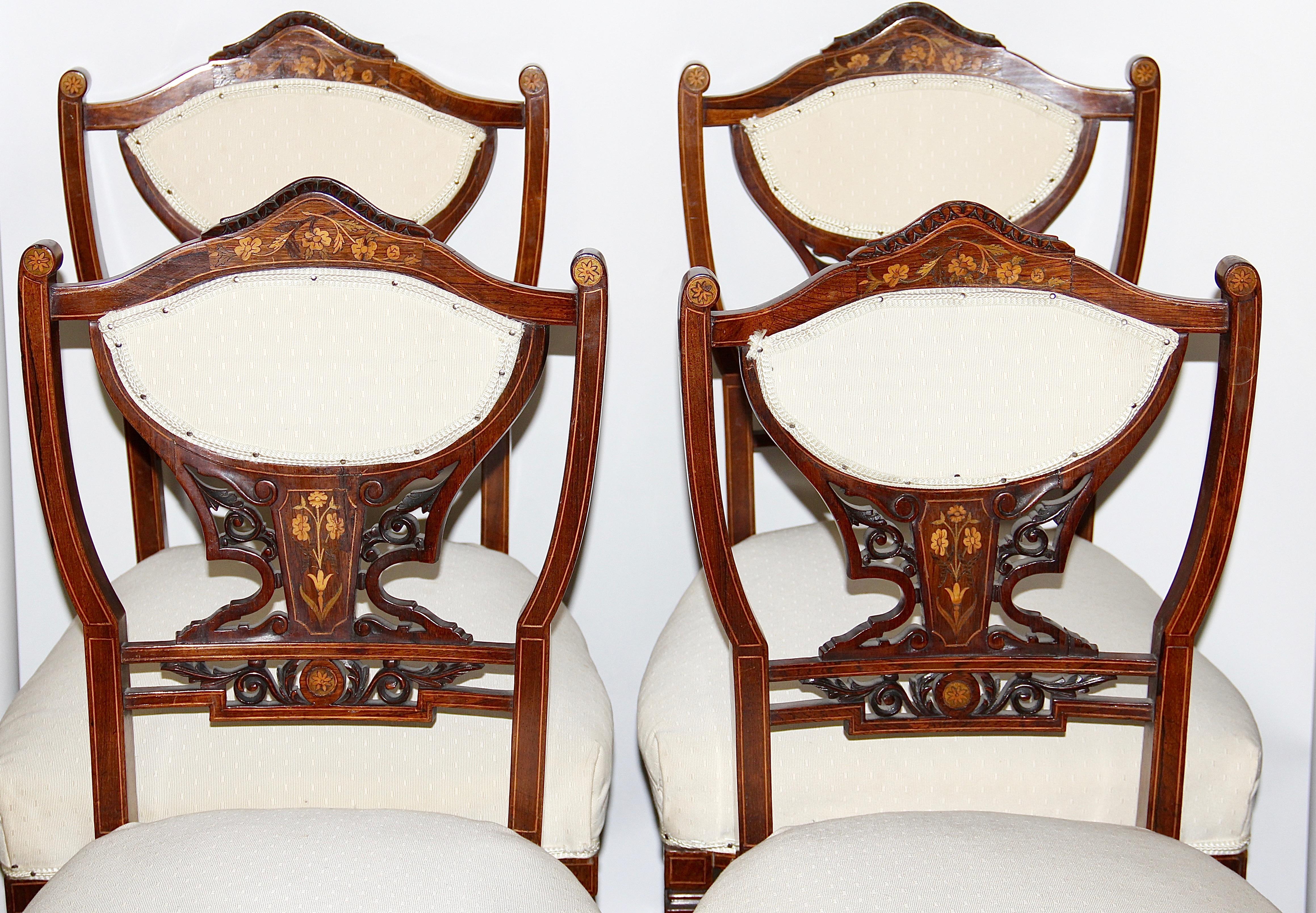 Set of four antique inlaid side chairs, 19th century.
