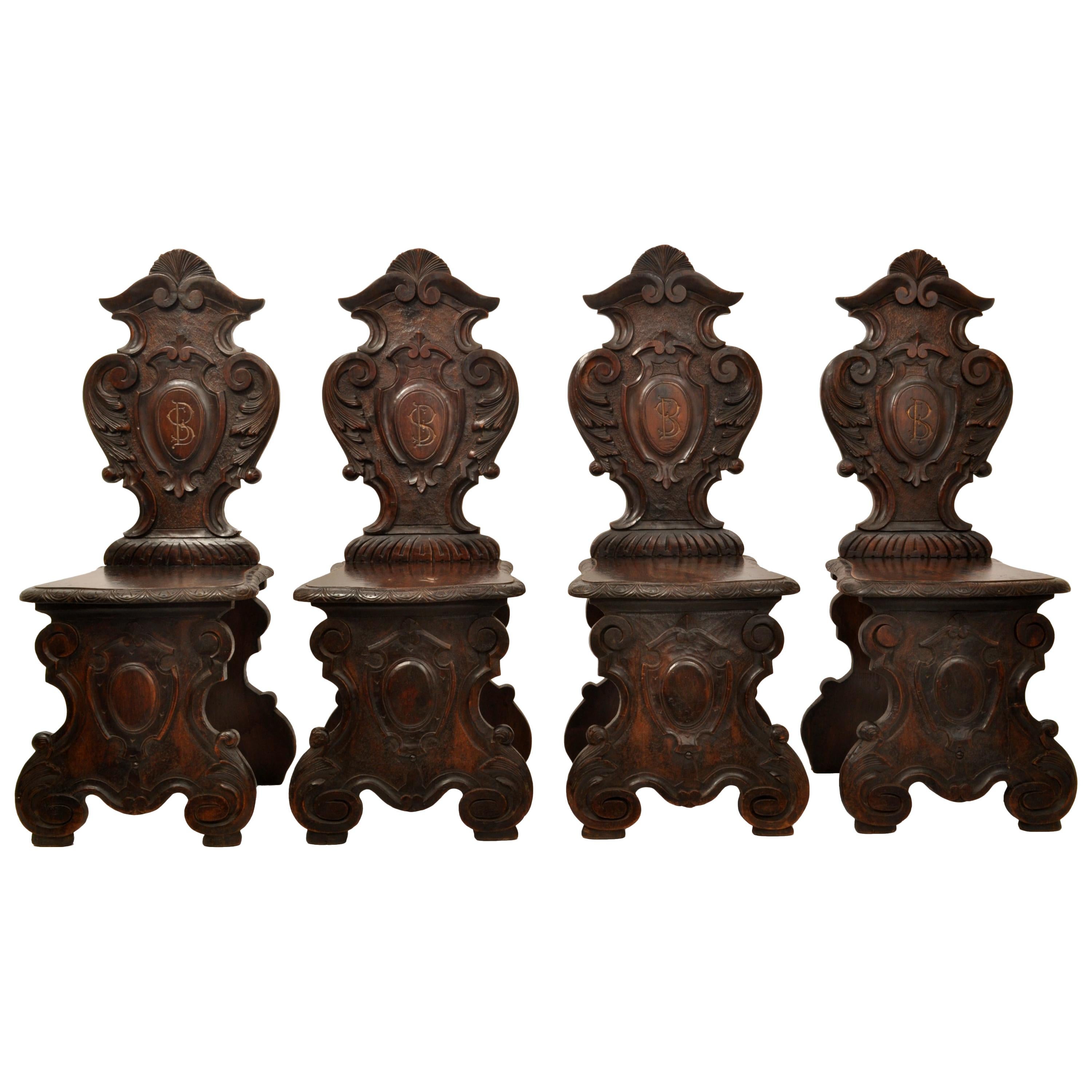 Set of Four Antique Italian Carved Walnut 18th Century Sgabello Hall Side Chairs