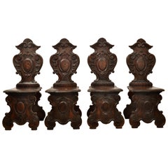 Set of Four Antique Italian Carved Walnut 18th Century Sgabello Hall Side Chairs