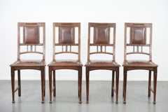 Set of four antique oak dining chairs in Art Nouveau style