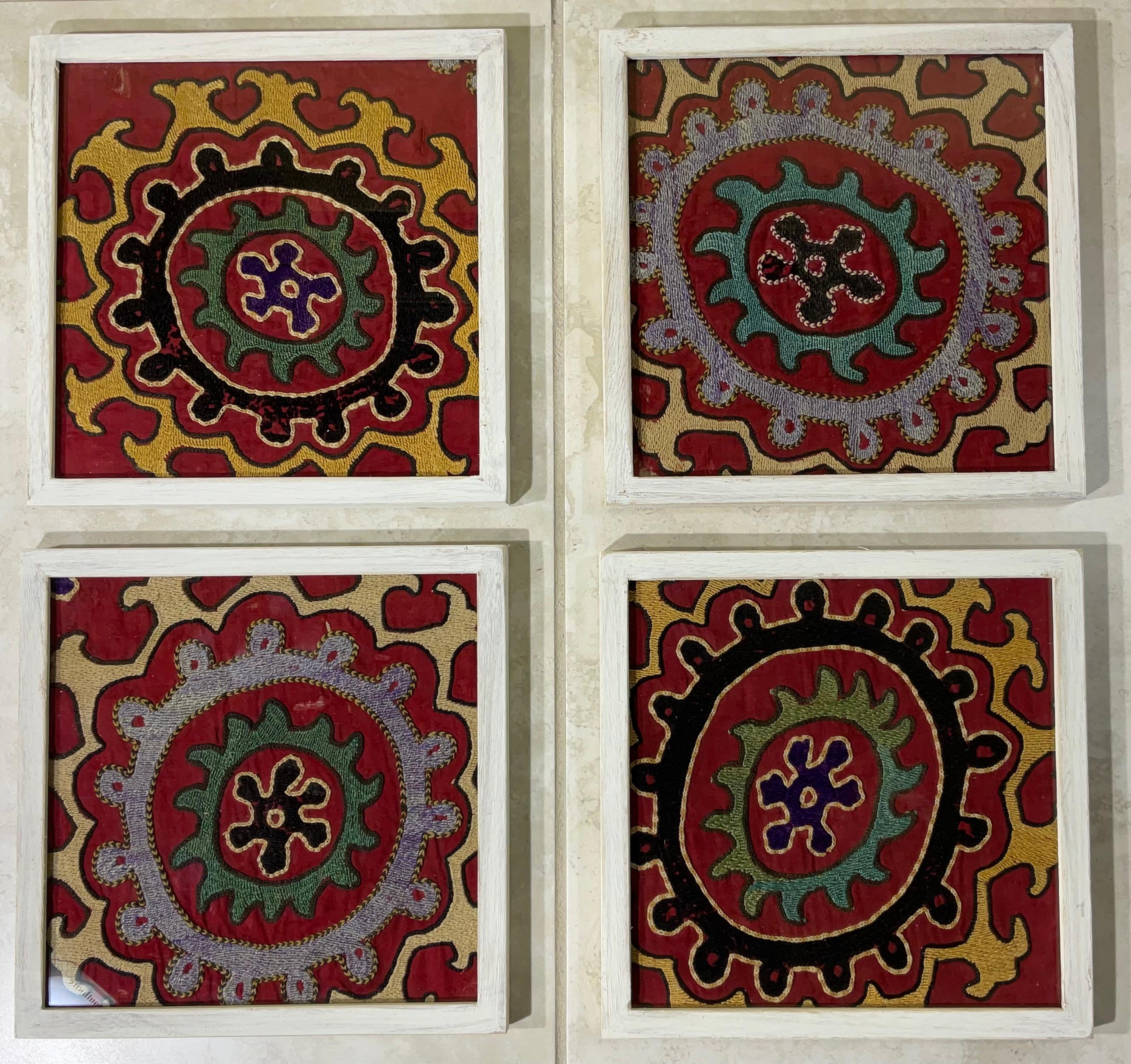 Exceptional antique hand embroidery fragments of Suzani textile, with circle of life round motif , professionally mounted on four hand painted wood shadow boxes to make beautiful versatile objects of art for wall hanging.
Even though these hand made