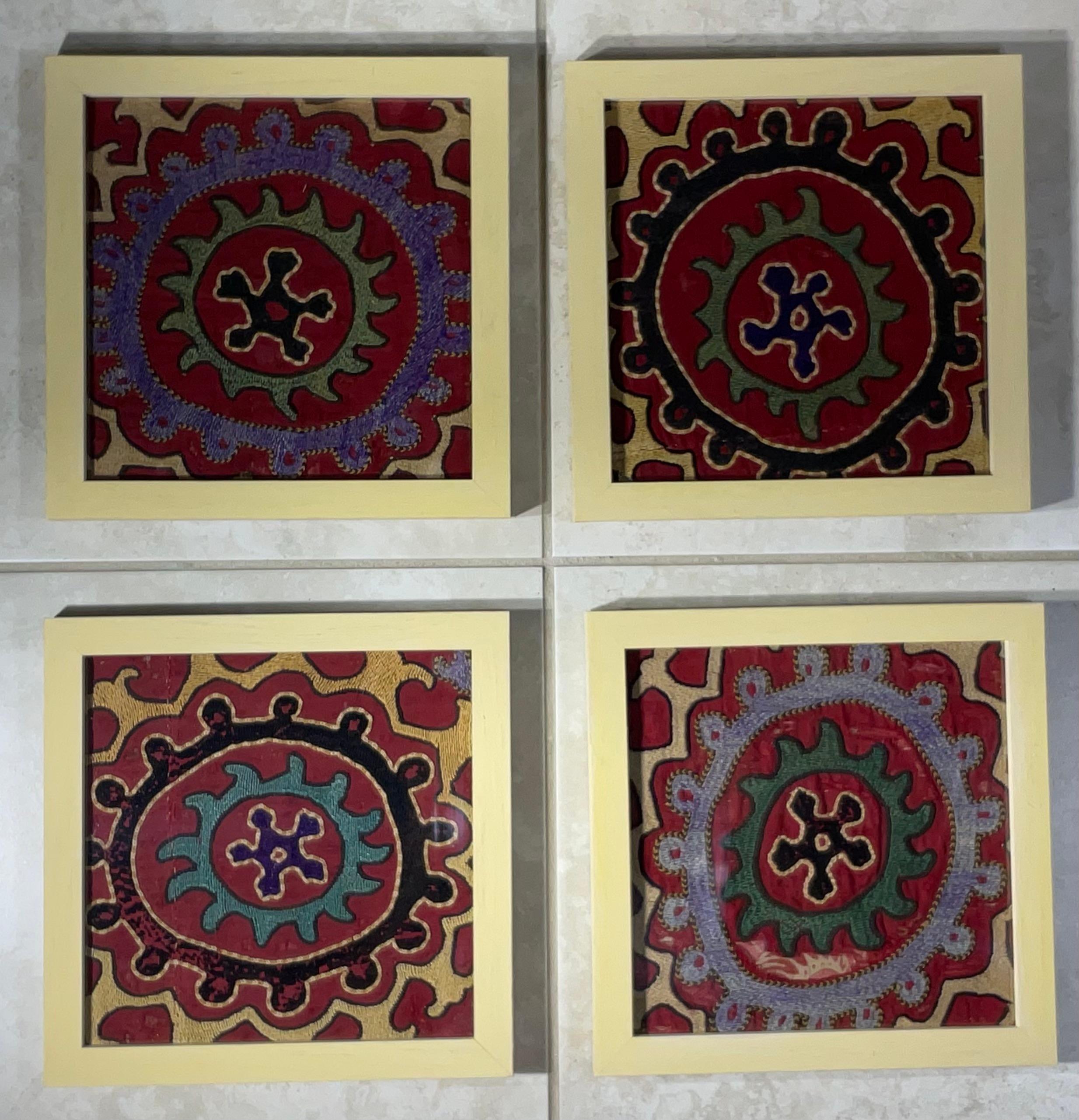 Exceptional antique hand embroidery fragments of Suzani textile, with circle of life round motif , professionally mounted on four hand painted wood shadow boxes to make beautiful versatile objects of art for wall hanging.
Even though these hand made