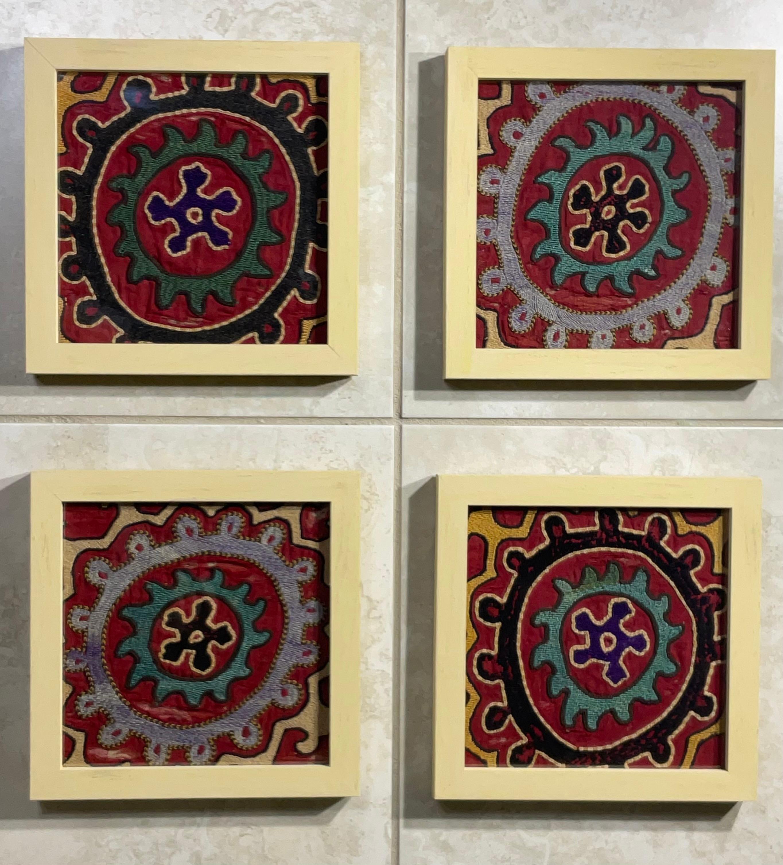Exceptional antique hand embroidery fragments of Suzani textile, with circle of life round motif , professionally mounted on four hand painted wood shadow boxes to make beautiful versatile objects of art for wall hanging.
Even though these hand made