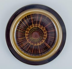 Set of four Arabia "Kosmos" dinner plates in stoneware. 1970s