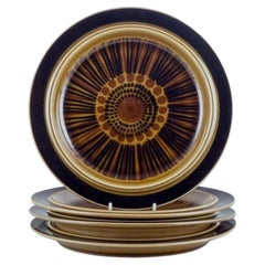 Set of four Arabia "Kosmos" dinner plates in stoneware. 1970s