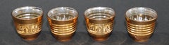 Ensemble de quatre verres arabes recouverts d'or