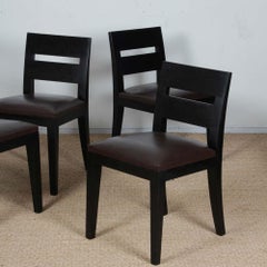 Set of four Archipel leather chairs by Christian Liaigre, 1994