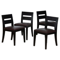 Set of four Archipel leather chairs by Christian Liaigre, 1994