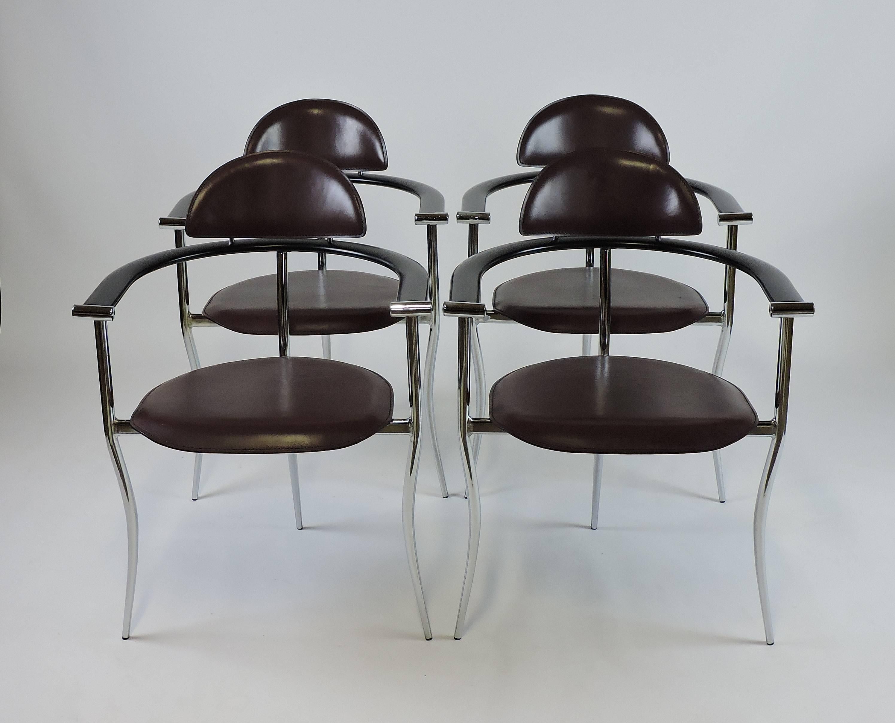 Striking set of four Marilyn chairs manufactured in Italy by Arrben. These chairs have wavy chrome frames, deep burgundy color leather seats and head rests, and black lacquered wooden arms.
  
