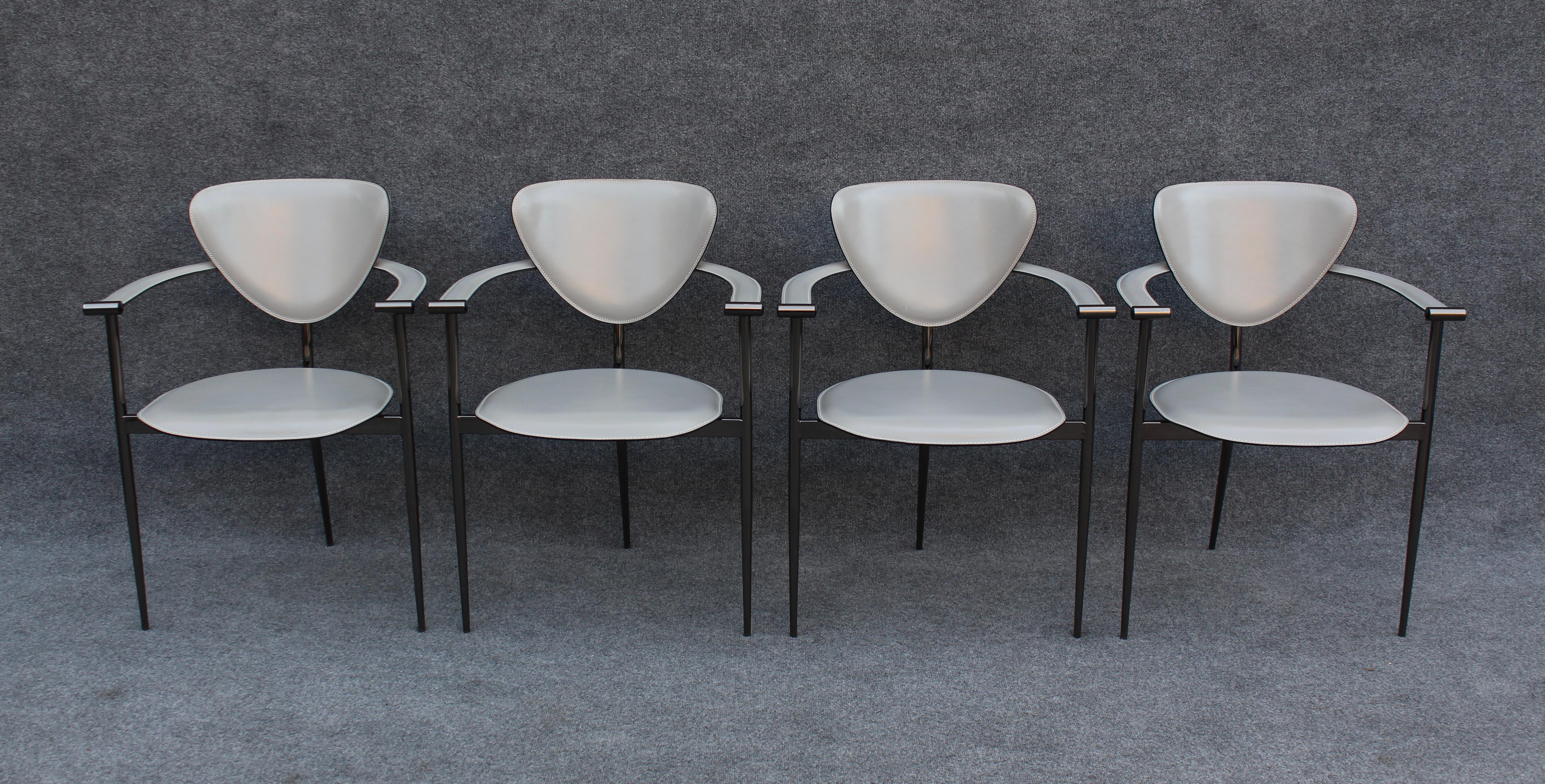 Designed in the 1980s in Italy, these chairs were amde by Arrben, a small but prestigious design and manufacturing comany. Over the years, the 'Marilyn' chair evolved to eventually culminate in this gray and black set. Most Marilyn chairs featured