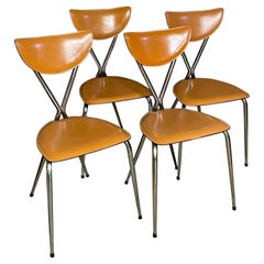 Ensemble de quatre chaises de salle à manger Arrben of Italy en cuir cognac et cadre chromé