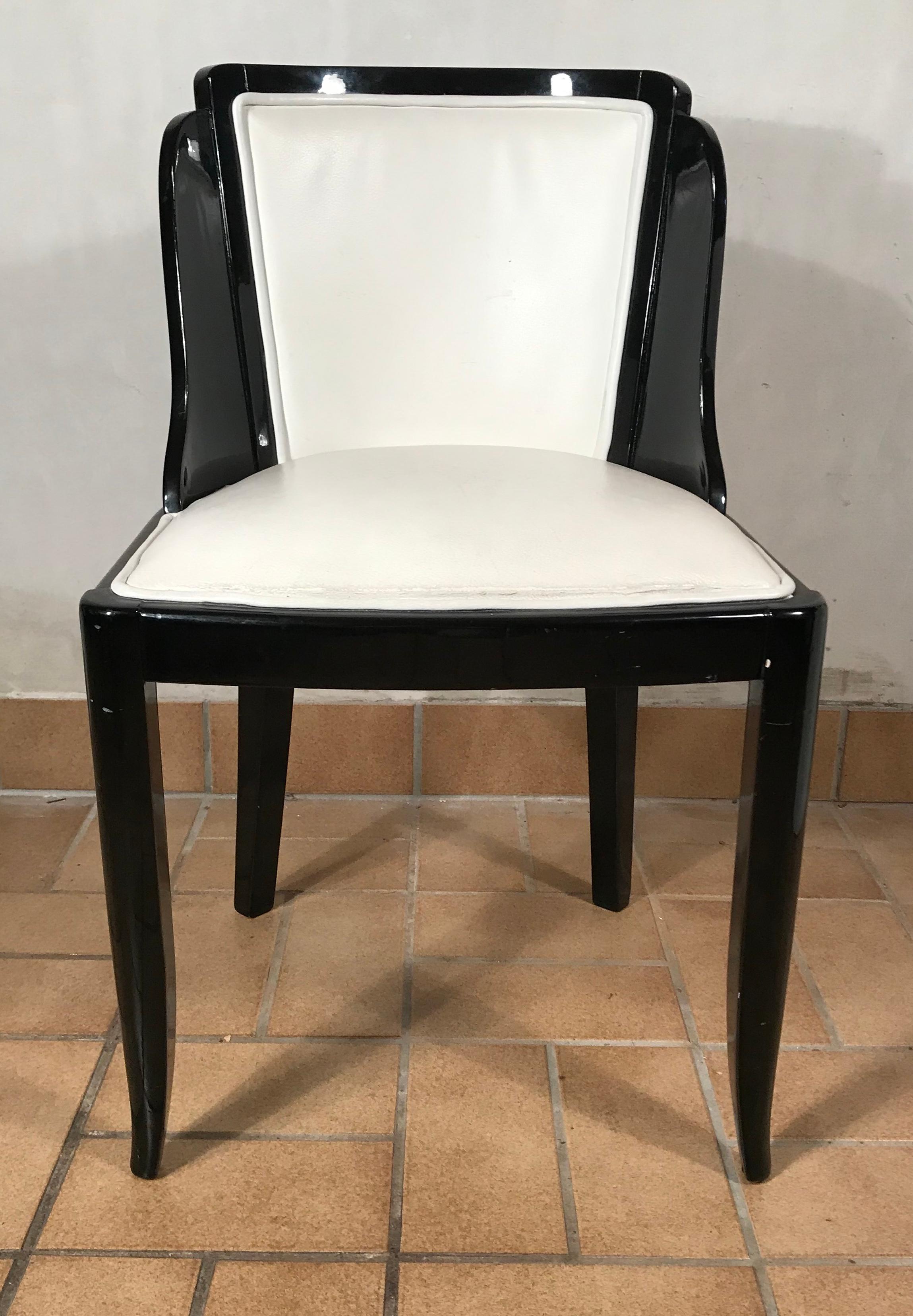 Set of four Art Deco chairs, France, 20th century.
Elegant chairs with black lacquer finish. The chairs are in very good original condition.
The white leather covering is also in good condition.