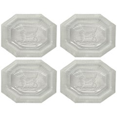 Juego de cuatro saleros de cristal Art Decó Scottie