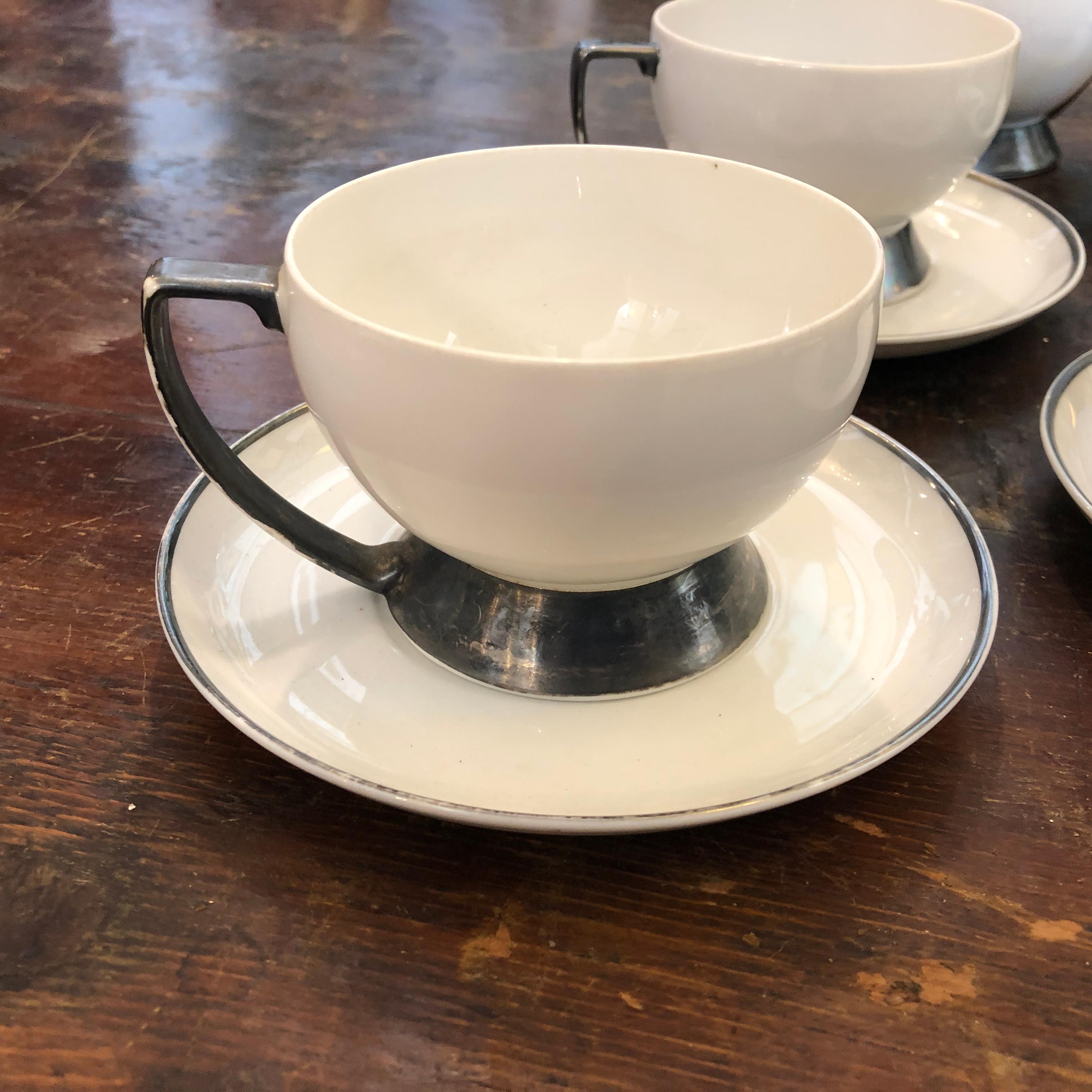 Stylish Art Deco Italian tea set by Guido Andlovitz for Verbano Laveno. Good conditions overall, size of tea cup cm 11 x 9 H 7.