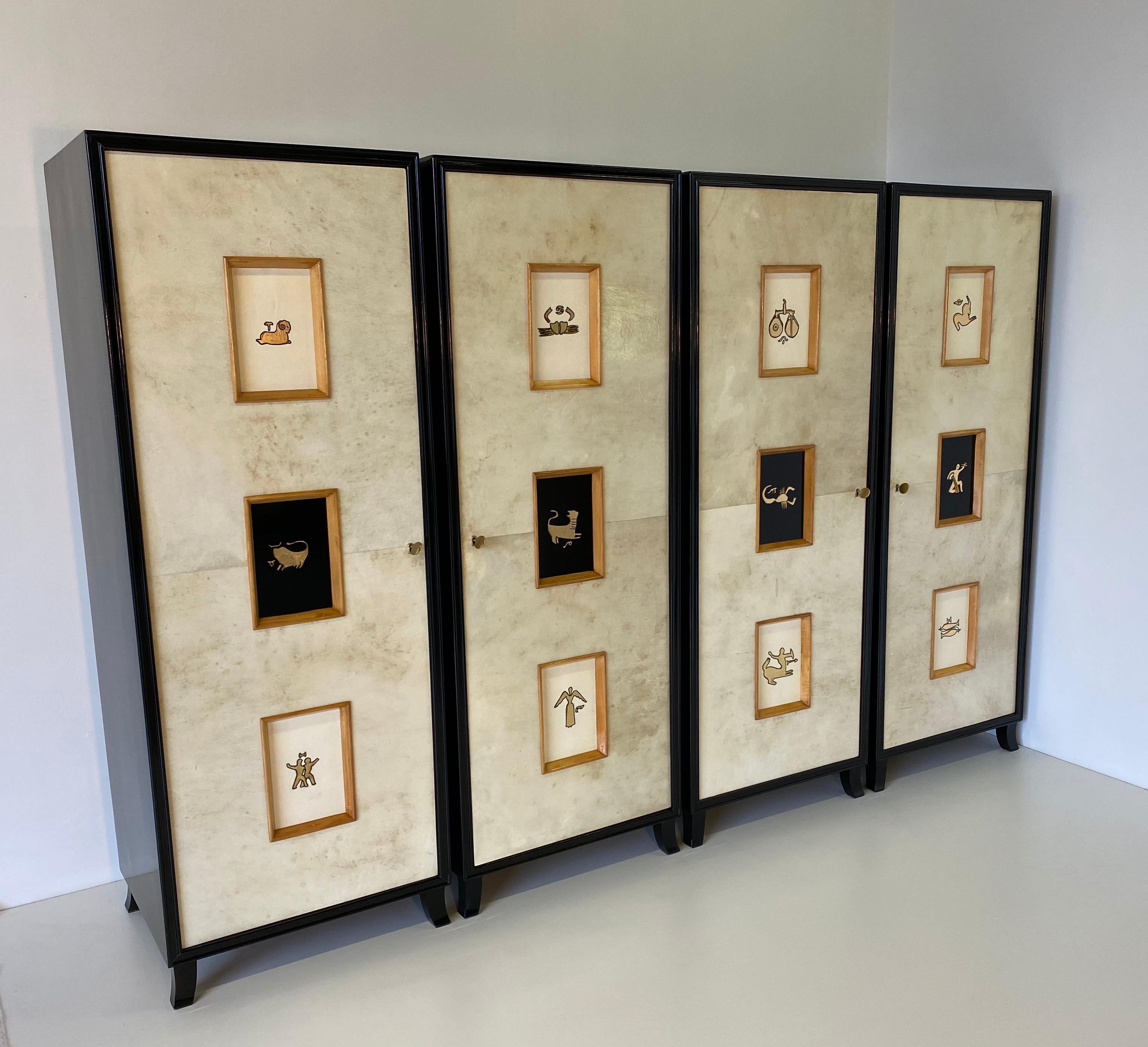 Mid-20th Century Set of Four Art Deco Parchment Cabinets with Gold Leaf Zodiac Signs, 1940s