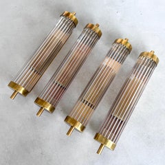 Set of Four Art Deco Wall Sconces in Brass and Fluted Glass, Chic Lighting