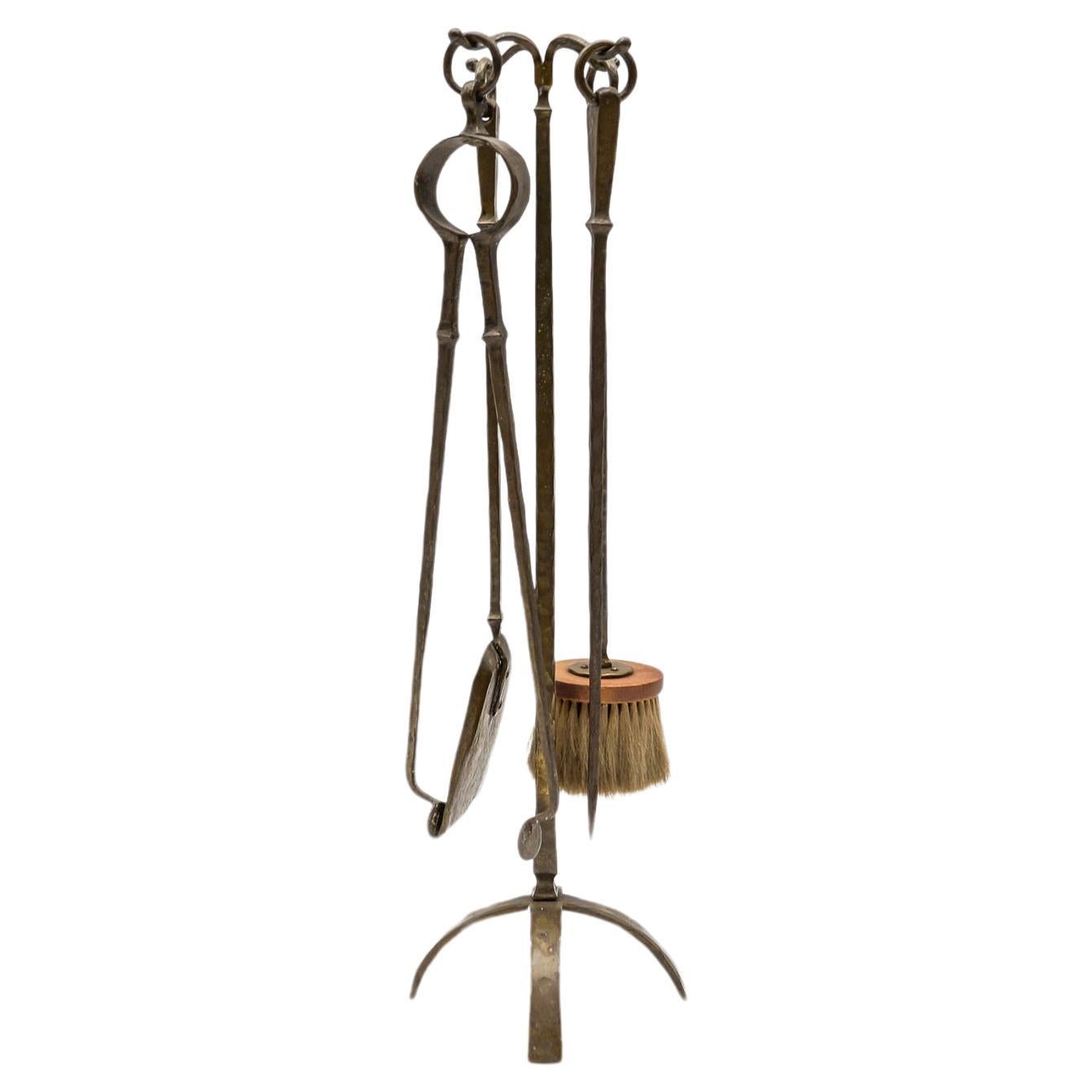 Set of Four Arts & Crafts Hand-Forged Iron Fire Utensils on a Matching Stand For Sale
