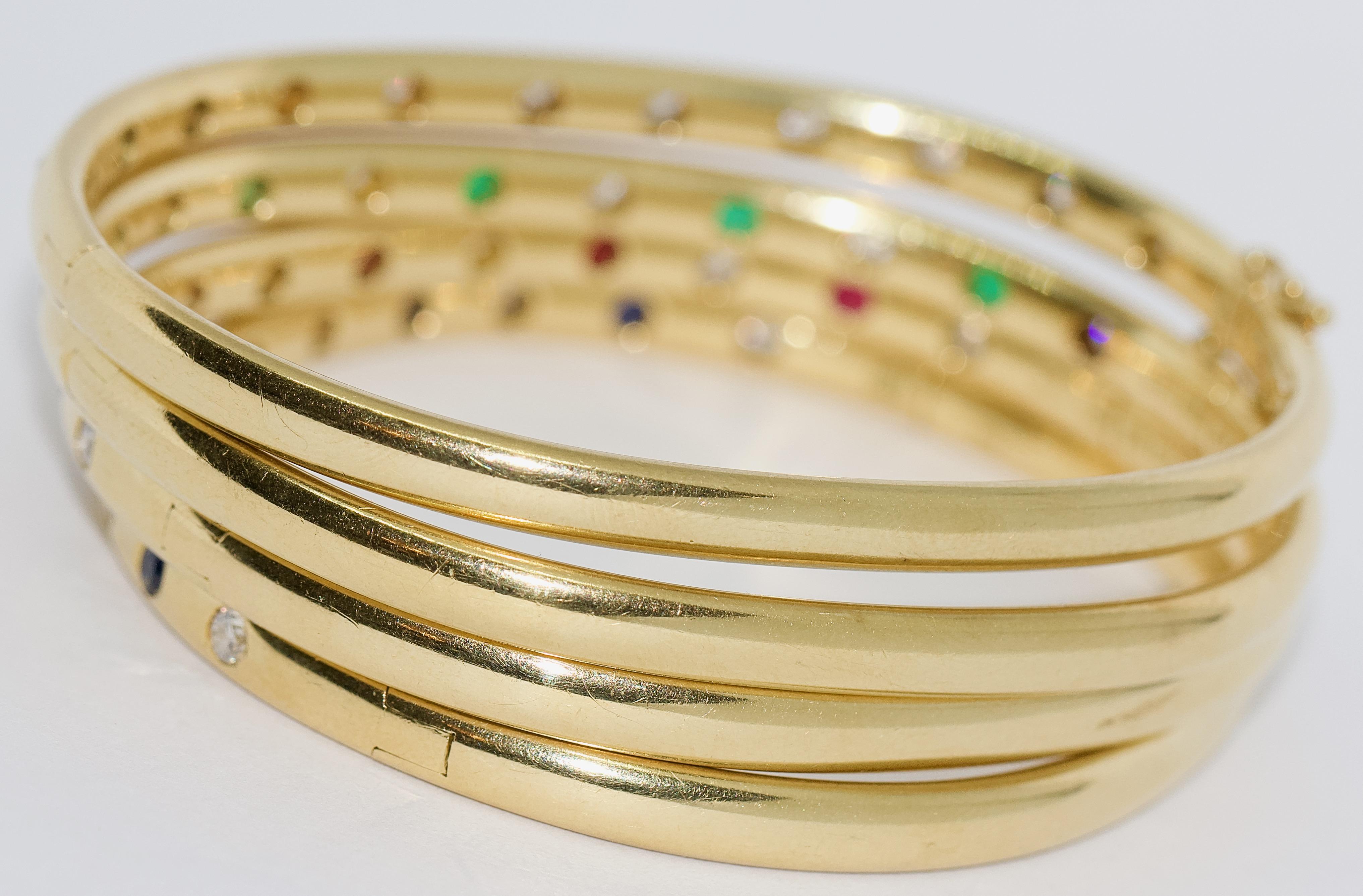 Set of Four Bangles, 18 Karat Gold Set with Diamonds, Sapphires and Emeralds In Good Condition In Berlin, DE