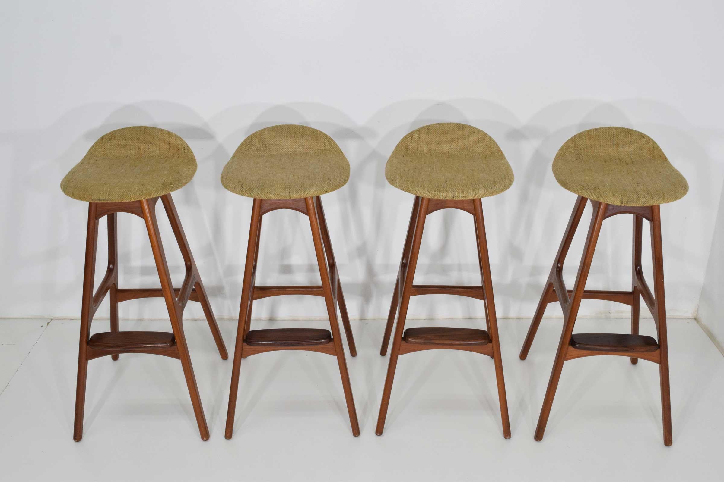 Bar stools, model OD61, designed by Erik Buch and manufactured by Odense furniture factory. The stools are of teak and rosewood and have fabric seats. The stool is in great vintage condition. They can be easily reupholstered.
 