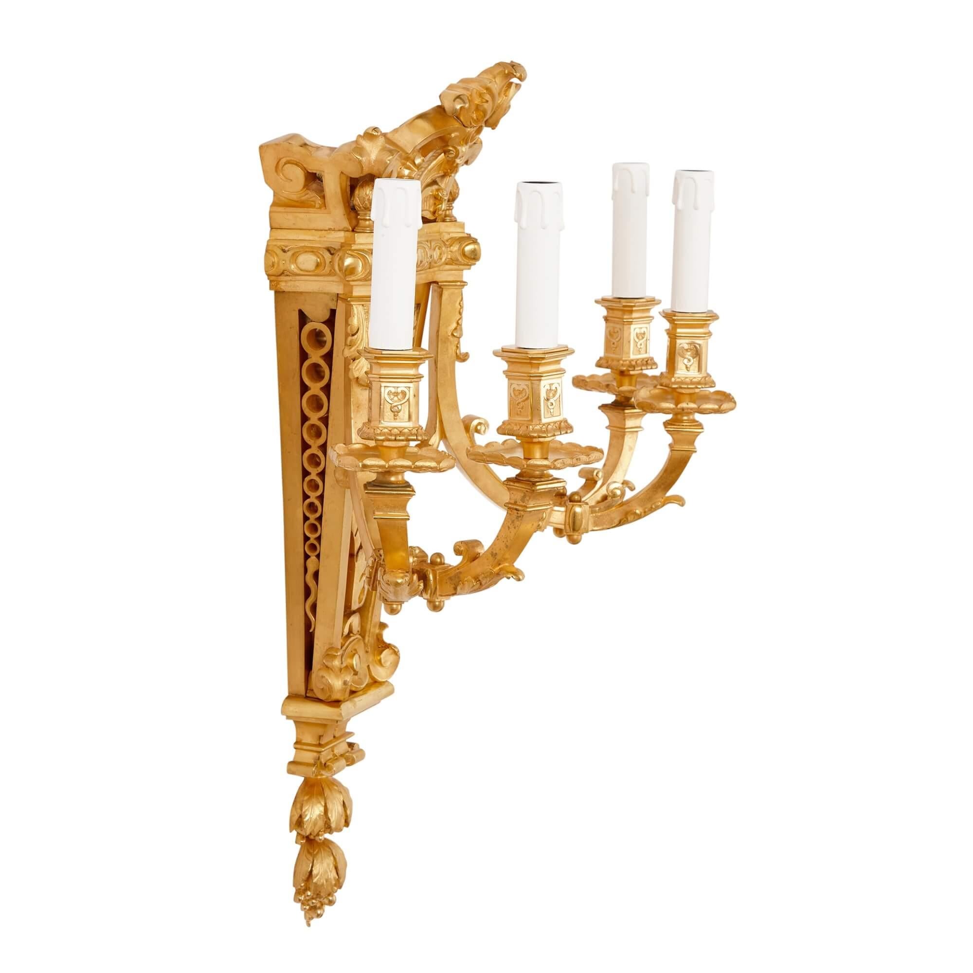 Baroque Ensemble de quatre lampes murales en bronze doré de style baroque par Picard en vente
