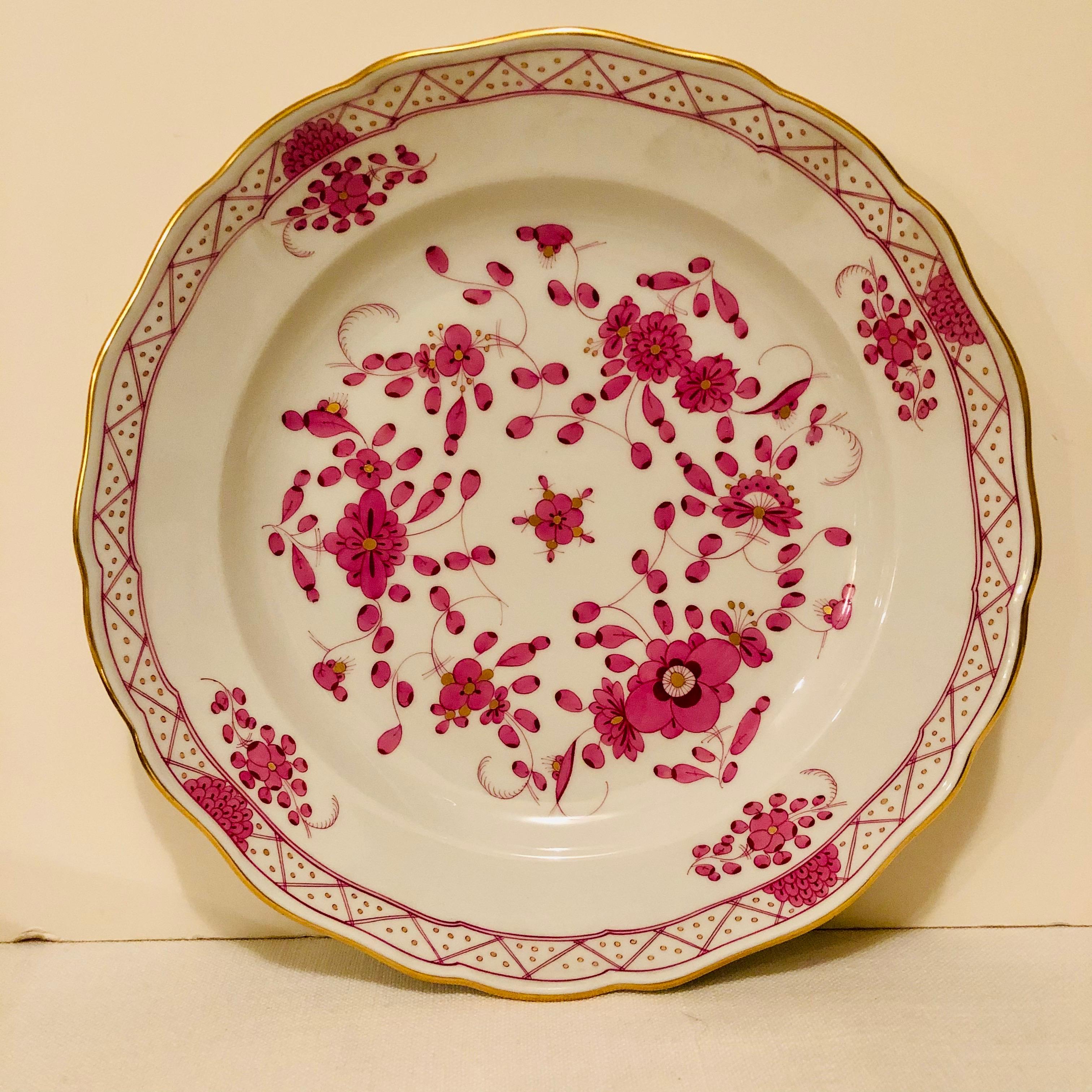 This is a set of four beautiful Meissen purple Indian dinner plates. Each dinner plate is ten inches in diameter. This would make an outstanding eye-catching addition to any dinner service. The detail and colors on these dinner plates are