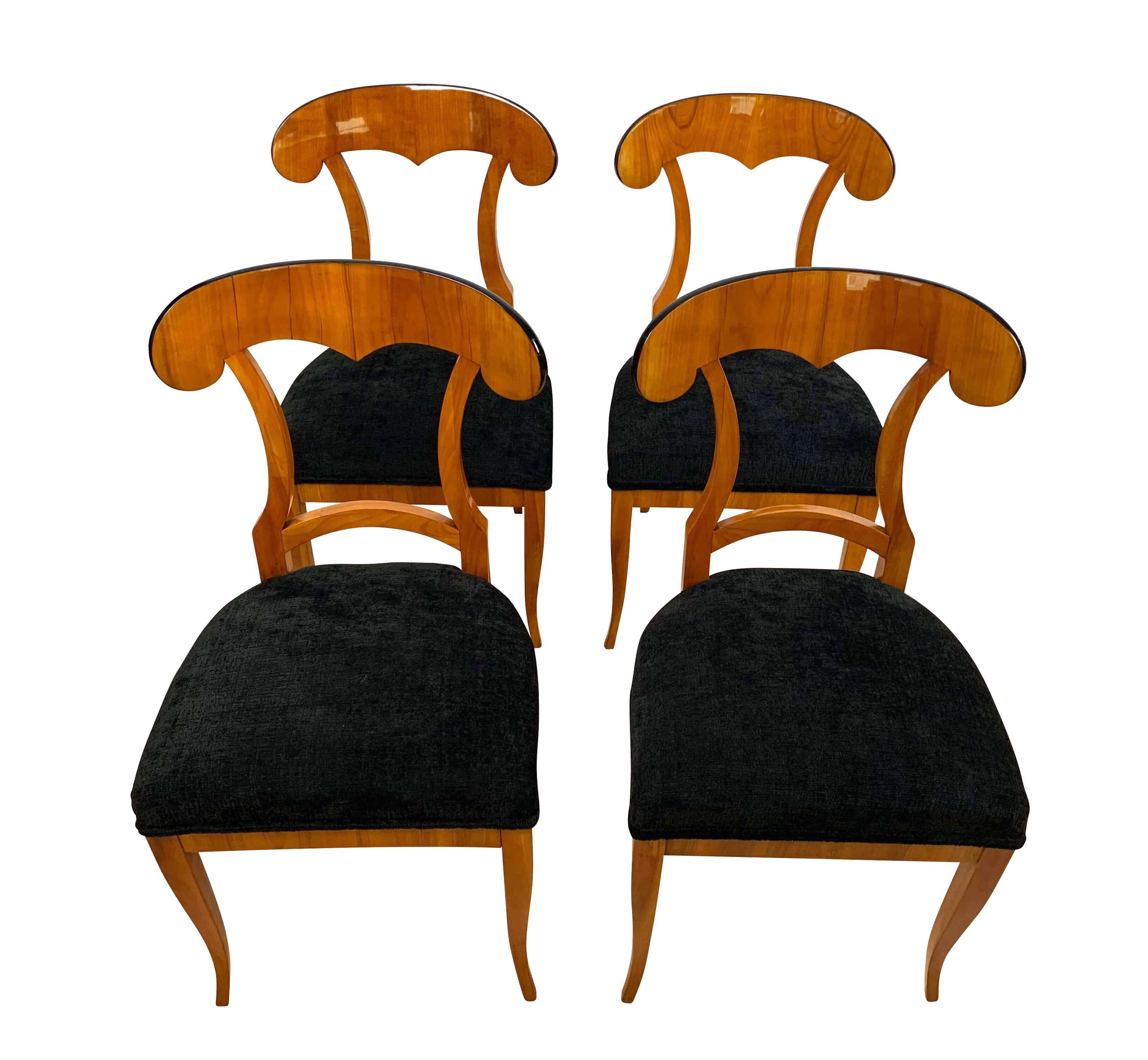 Set of four Biedermeier Shovel chairs, cherry veneer, South Germany, circa 1820

Elegant and comfortable set of four original, rare, neoclassical Biedermeier shovel chairs (scoop shaped back). Friendly, bright cherry wood veneered (shovel and