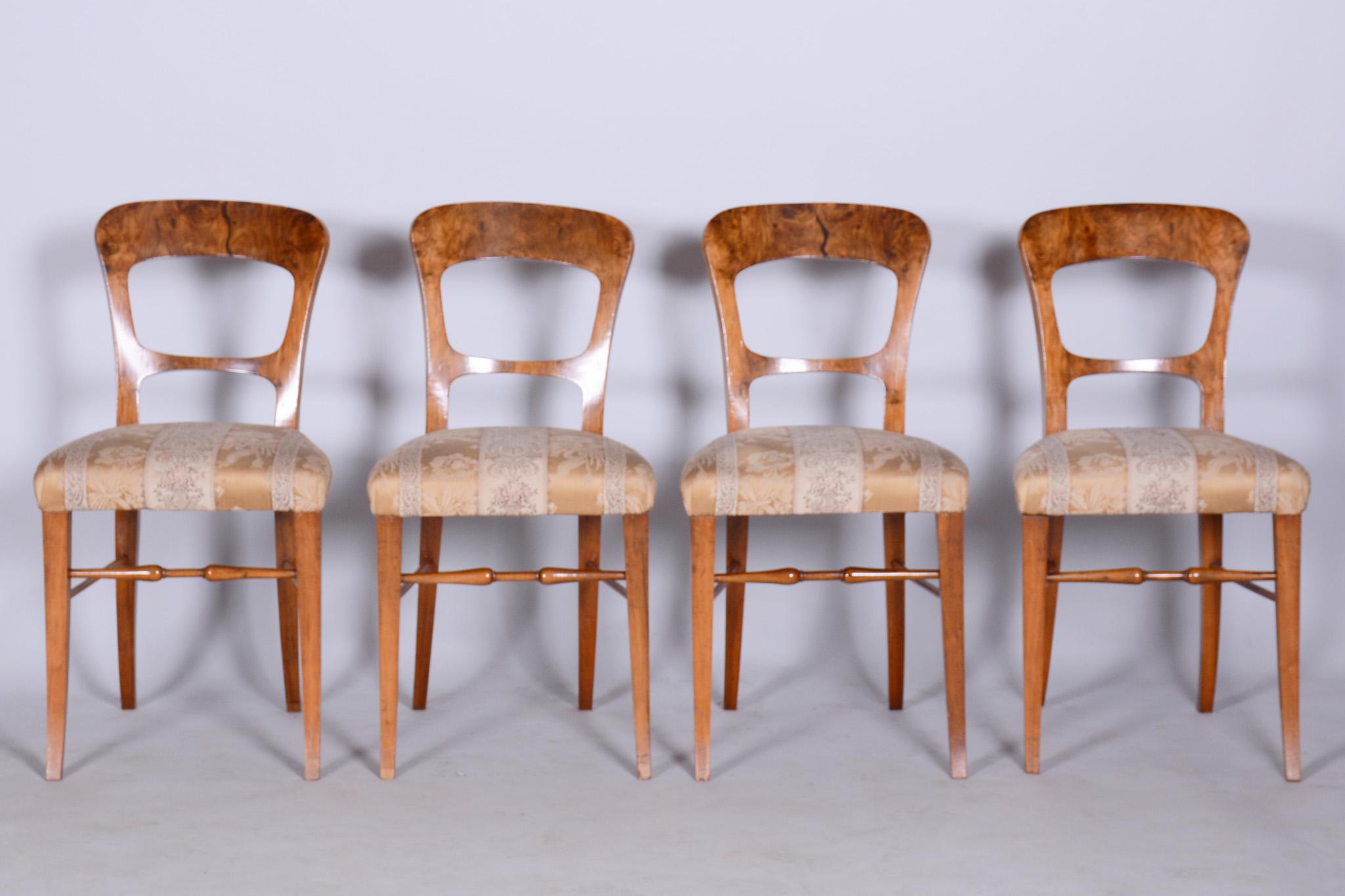 Set of four Biedermeier walnut chairs.

Source: Czechia
Period: 1830-1839
Material: Walnut, Fabric
Seat height: 50 cm / 19.69?

Very well-preserved original condition.
Professionally cleaned upholstery.
Solid and stable