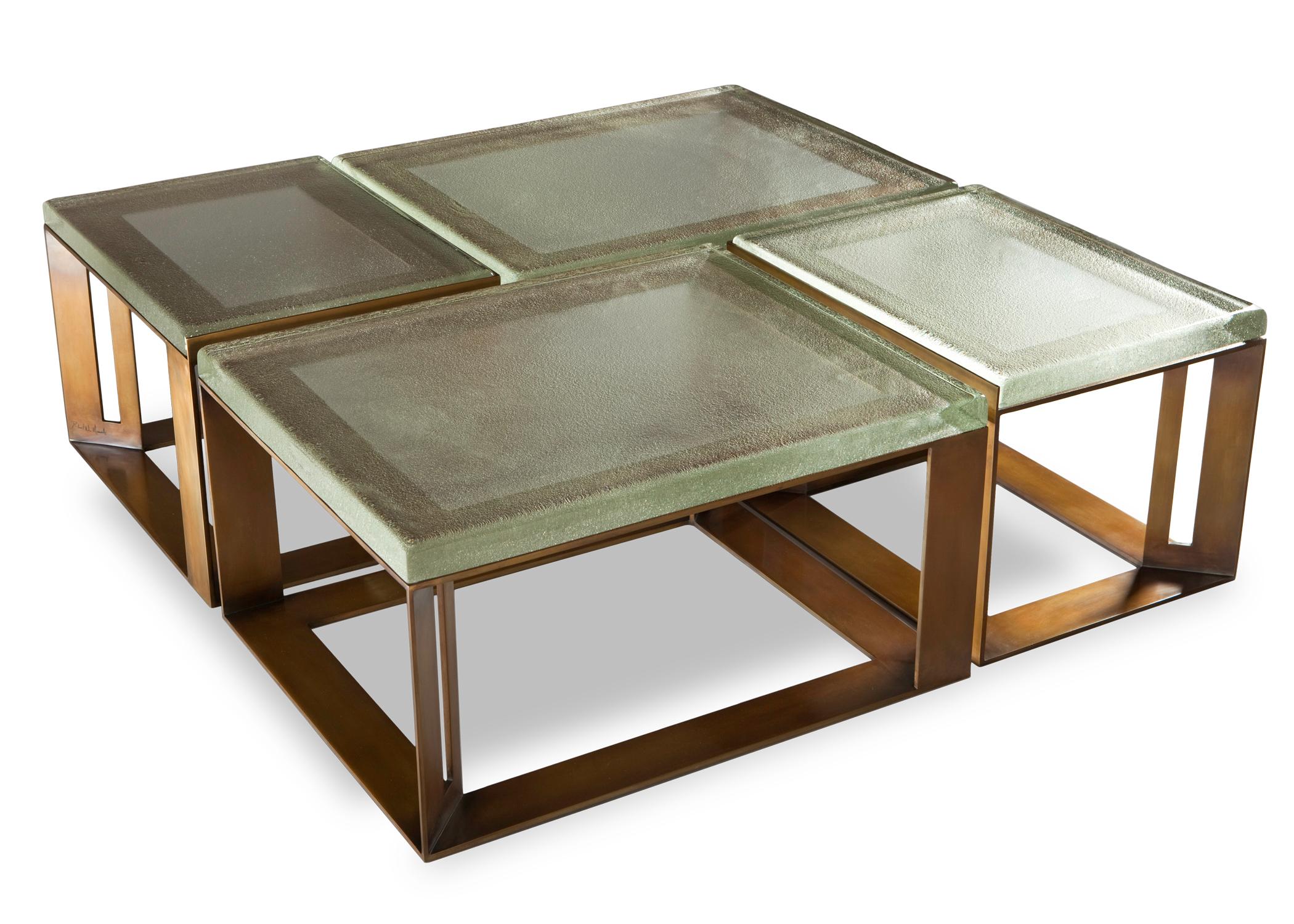Set of four steel tables finished in a gold-brown lacquer, supporting thick cast glass tops. Custom sizes and finishes available.
Measures:
Two taller tables: Height 19” x width 18.5” x depth 25”
Two shorter tables: Height 18” x width 31” x depth