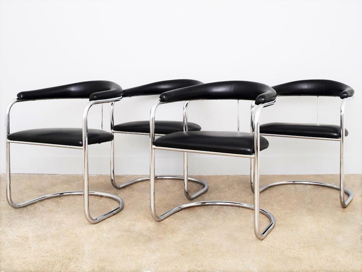The Hungarian designer Anton Lorenz is famous for his timeless steel tube furniture. The original cantilevered chrome base and black upholstery.