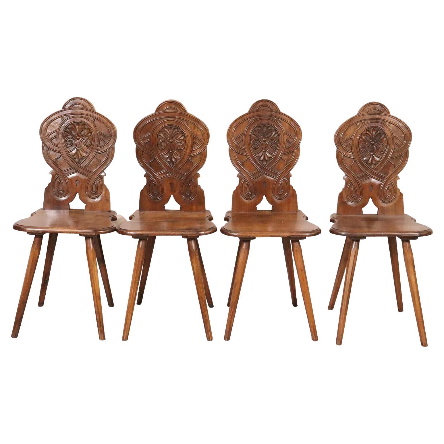 Set of Four Black Forest Carved Tavern Bavarian Inn Chairs, 1890s For Sale