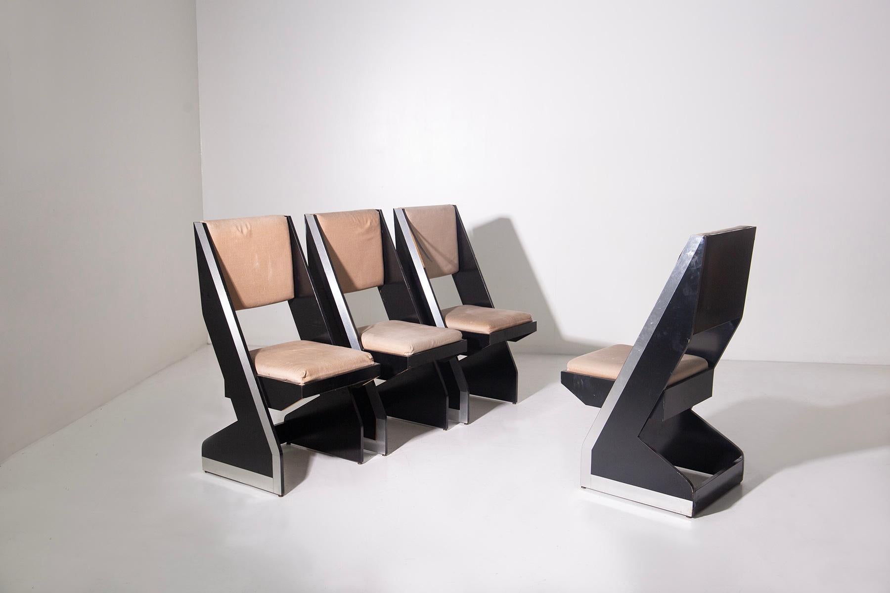 
This stunning set of four postmodern Italian chairs from the 1980s perfectly embodies the bold and avant-garde aesthetic of the era, subtly echoing the visionary principles of Space Age design. Characterized by futuristic, rigid lines, these chairs
