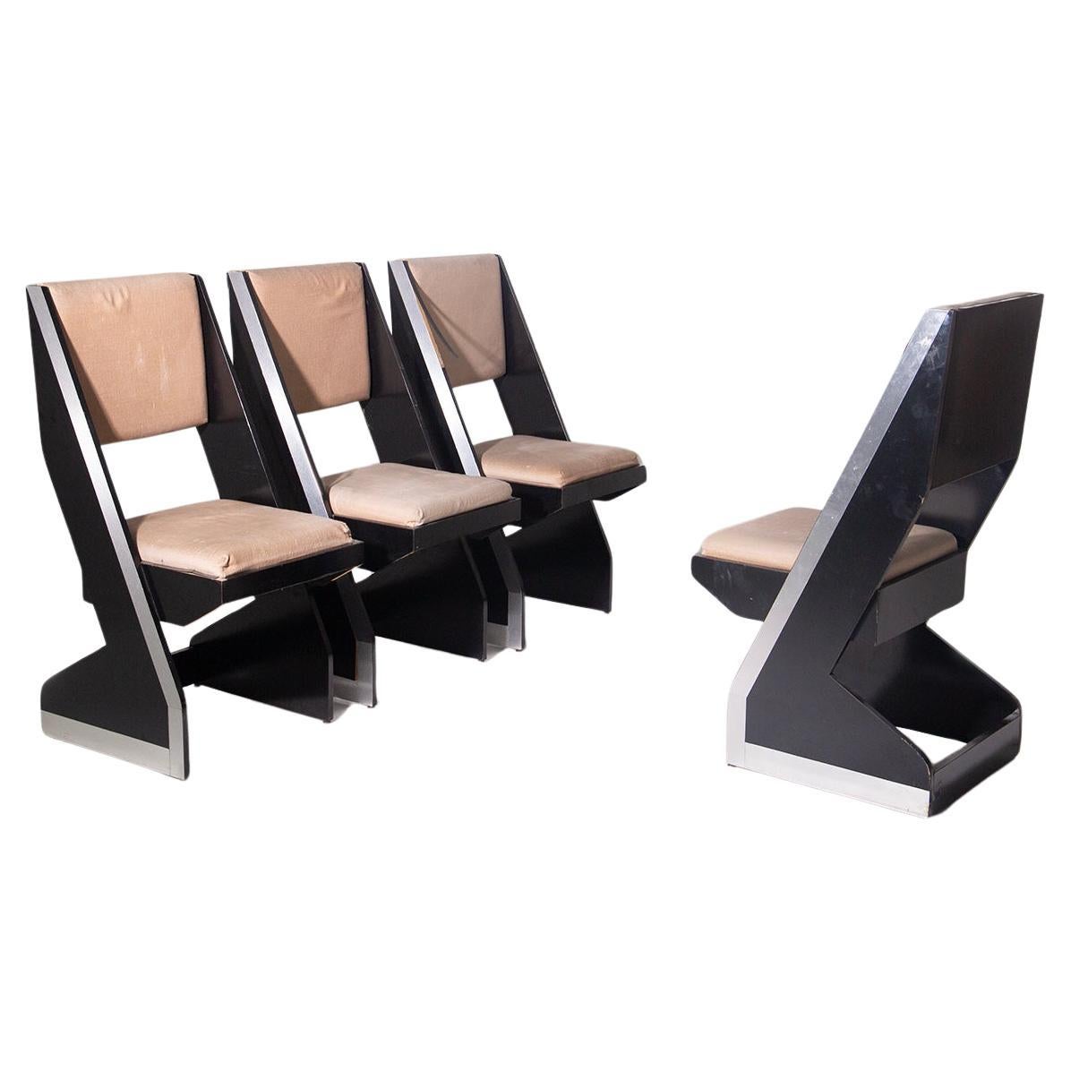 Set of four black Italian post modern chairs