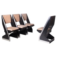 Set of four black Italian post modern chairs