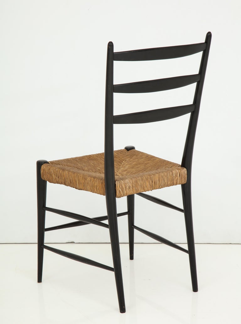 Set of Four Black Lacquer and Rattan Chairs For Sale at 1stDibs