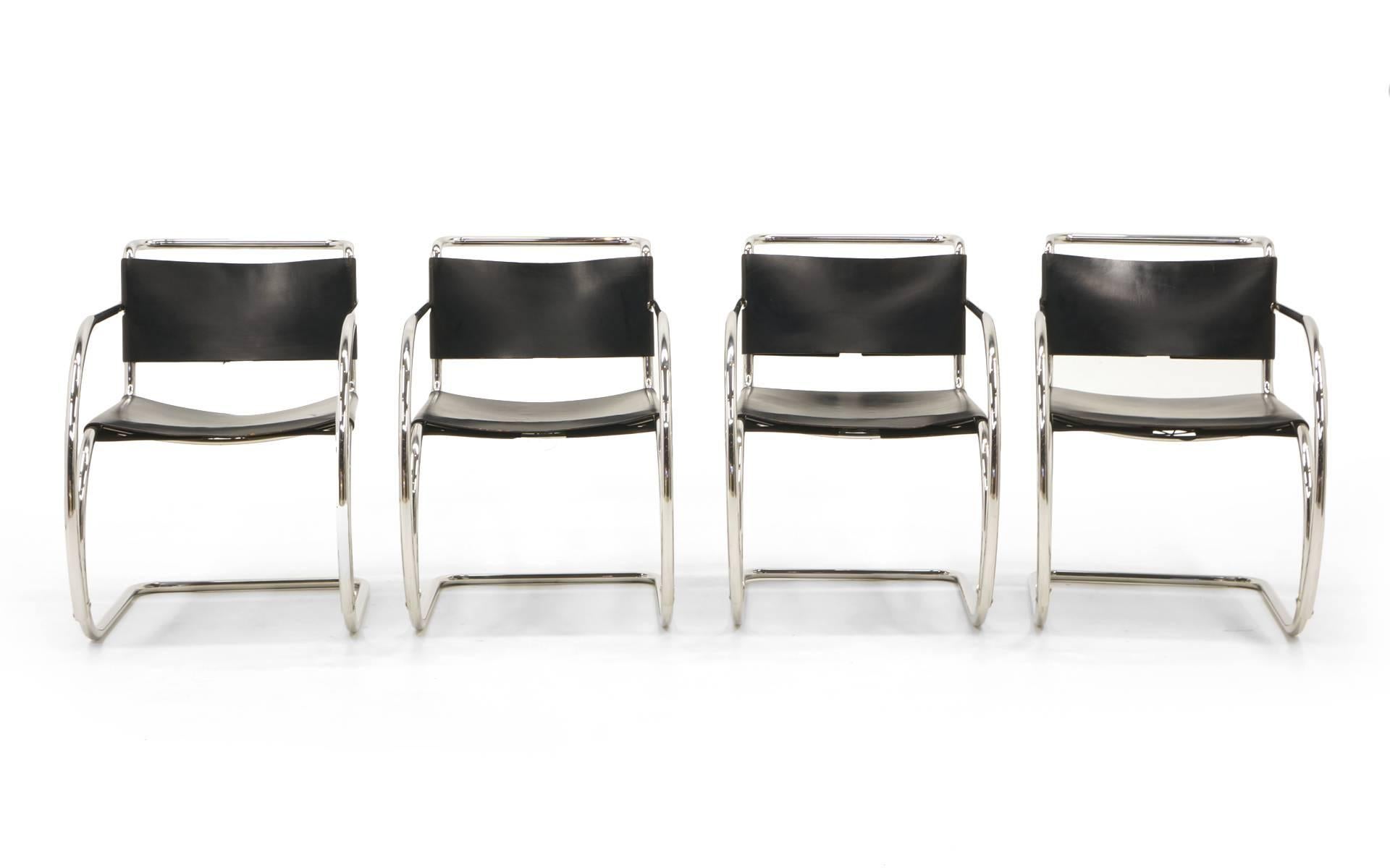 Four Ludwig Mies van der Rohe black leather and chrome tubular steel MR 20 armchairs. Manufactured by Knoll in Italy, these 1960s production are in original condition with only attractive minor wear. Nice examples of this design in a matched set. 