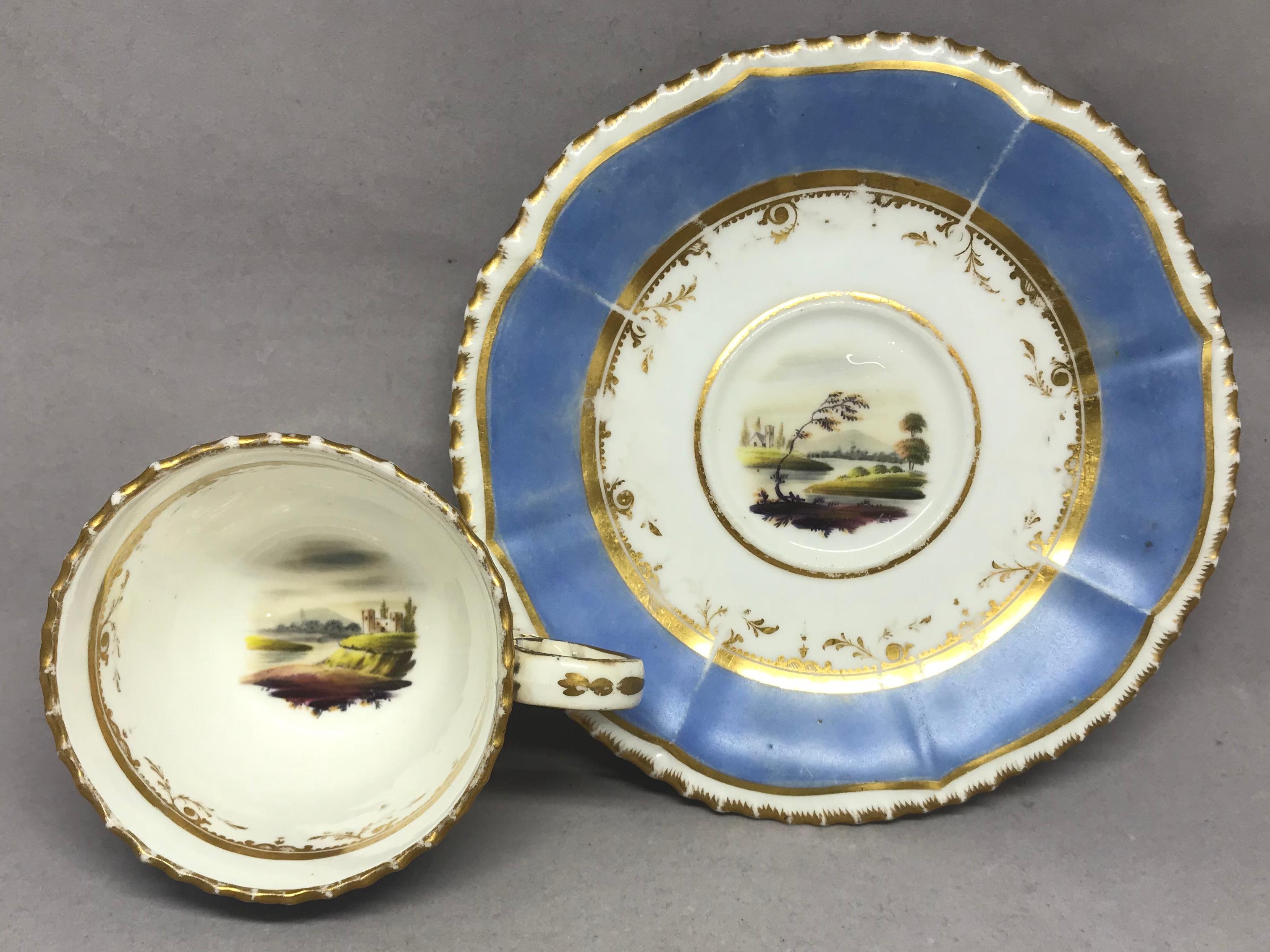 Porcelain Set of Four Blue and Gilt Painted English Scenes Coffee Cups For Sale