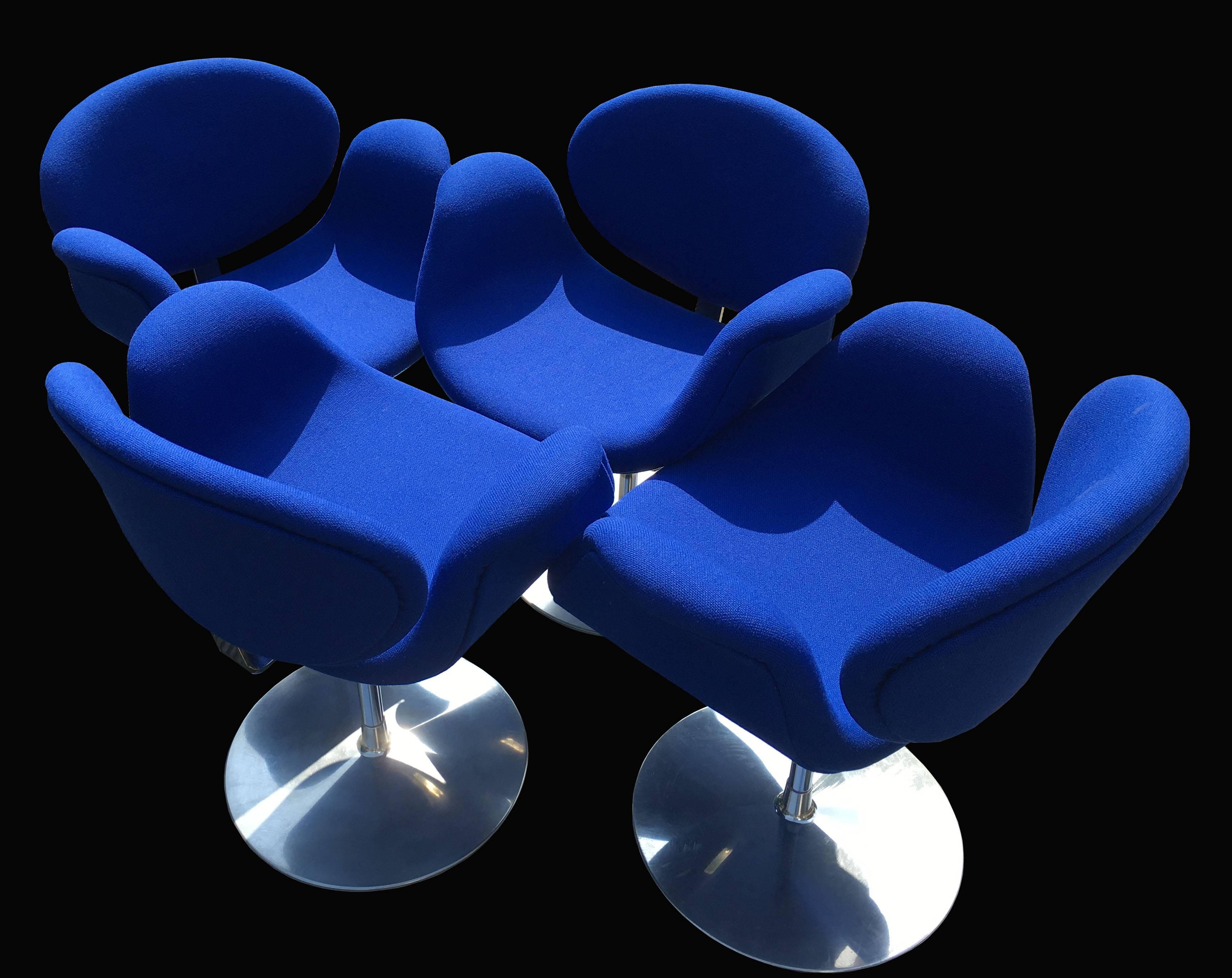 A good, freshly upholstered set of four of these iconic swivel side or dining chairs by Pierre Paulin.