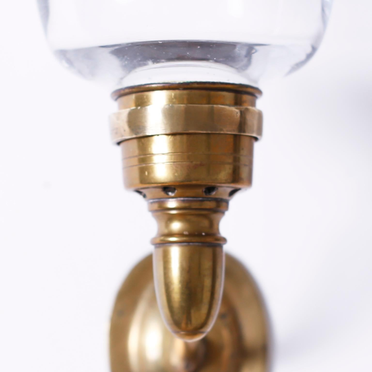 British Colonial Set of Four Brass and Glass Candle Hurricane Sconces, Priced Per Pair